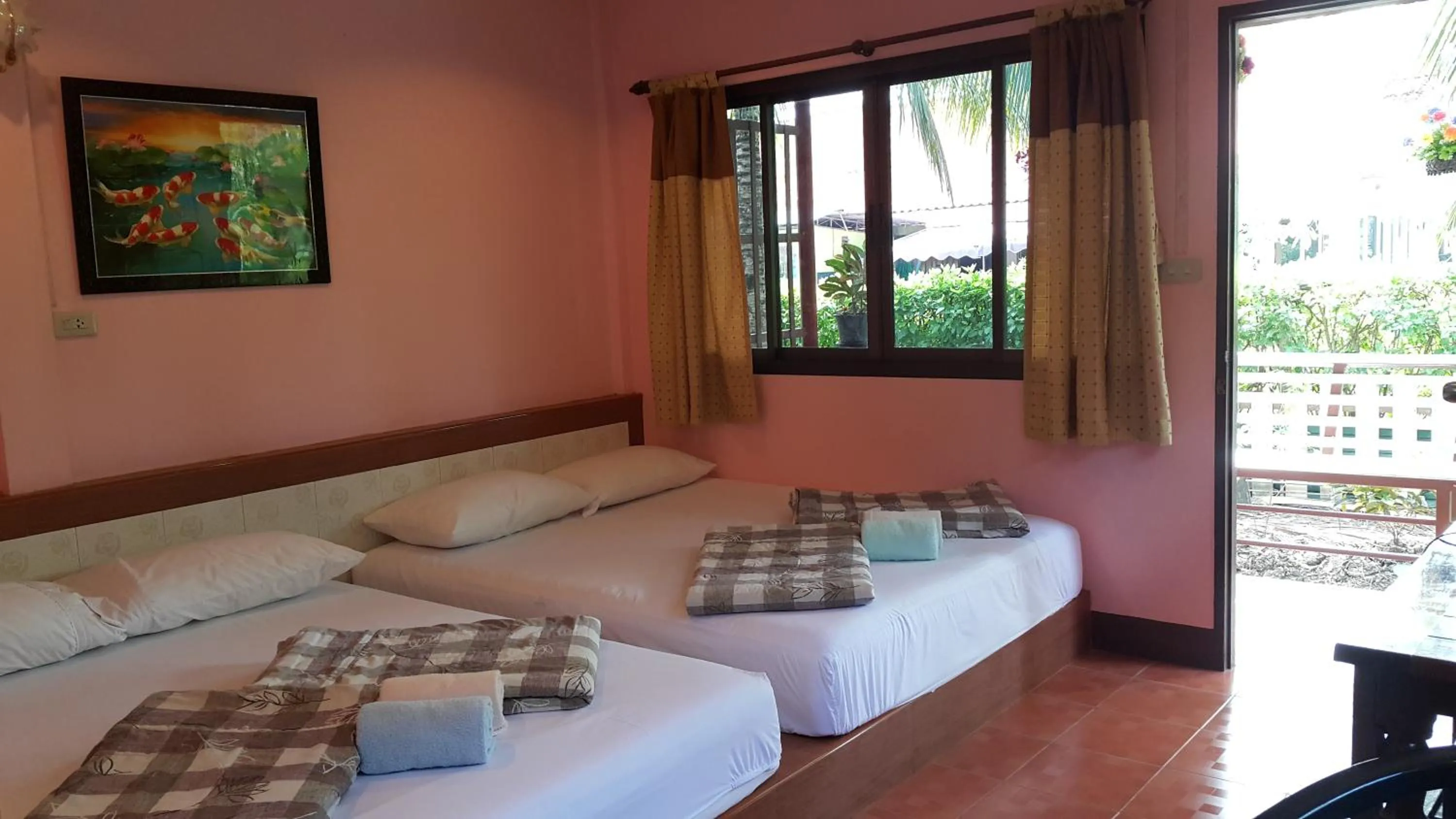 Bed in Warakorn Baansuan Amphawa