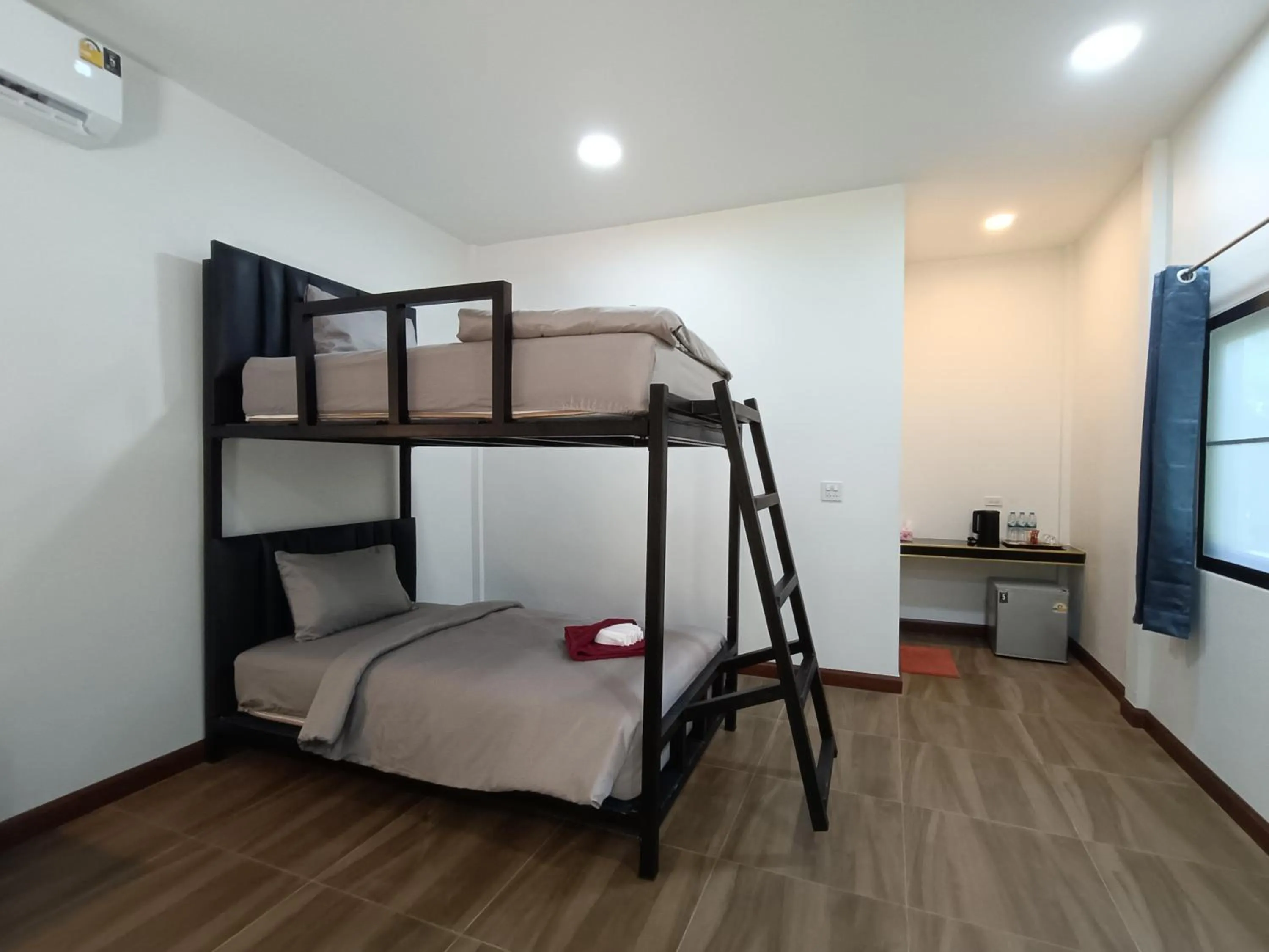 Bed in Khao Sok Palm Garden Resort