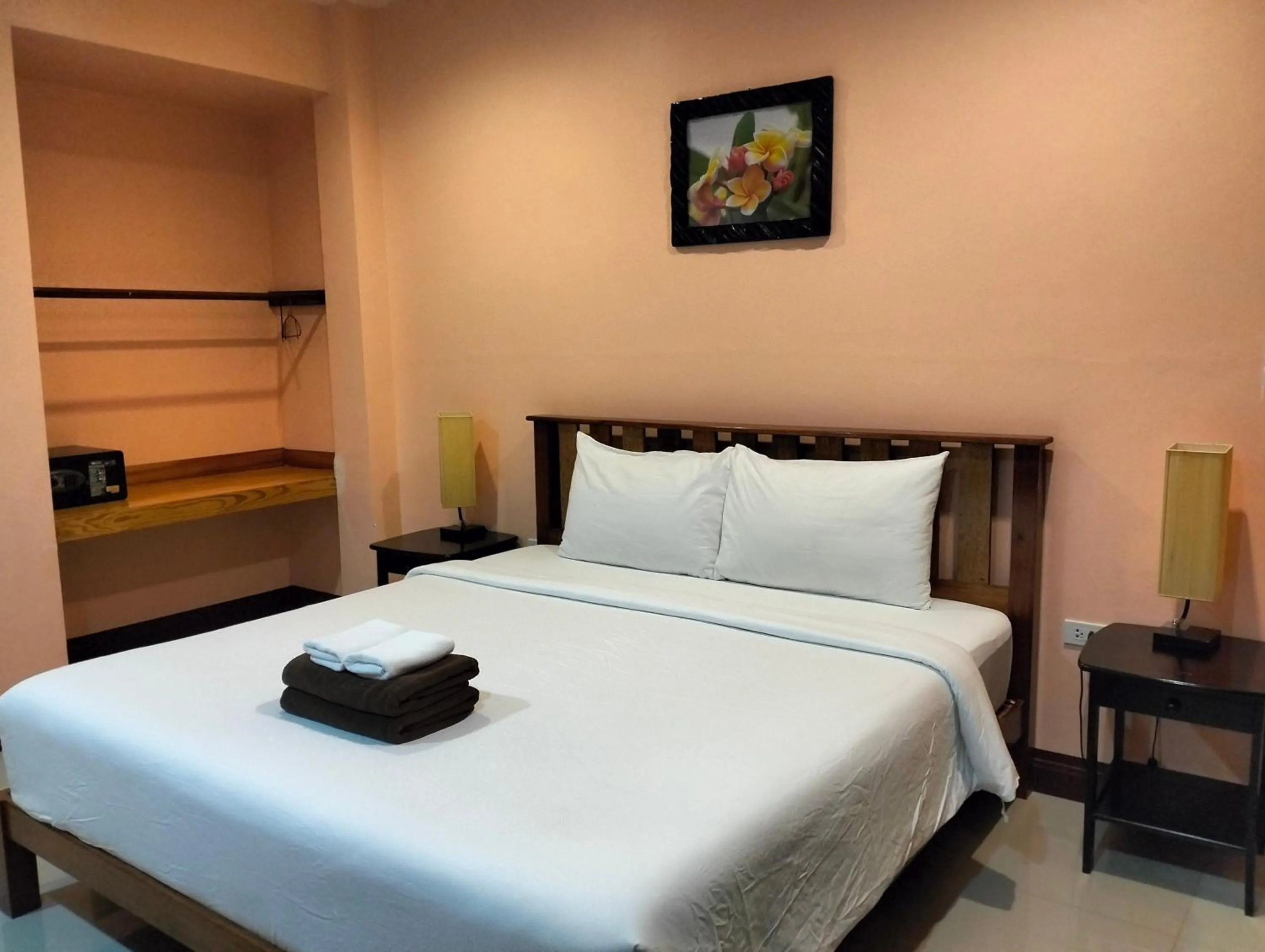 Bed in Khao Sok Palm Garden Resort