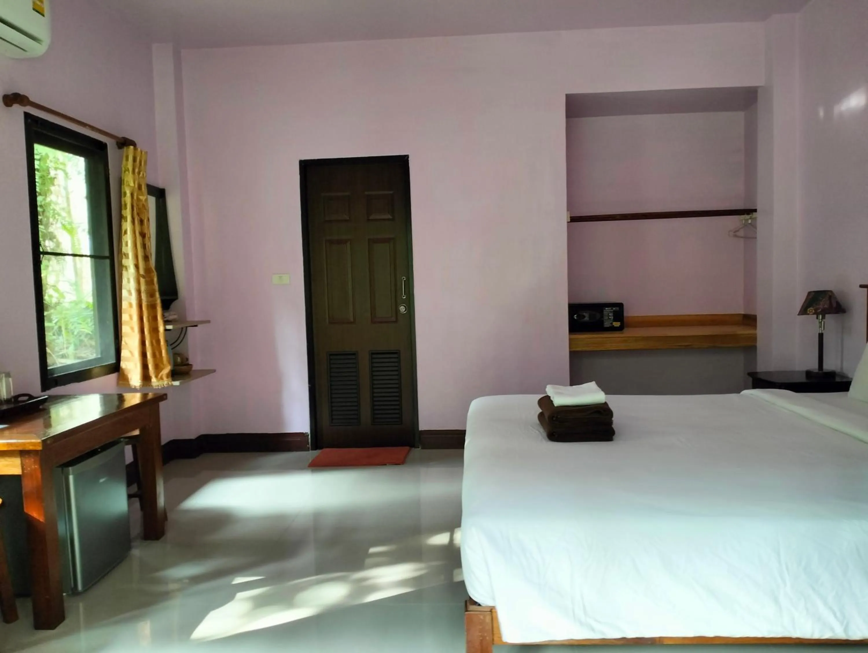 Bed in Khao Sok Palm Garden Resort