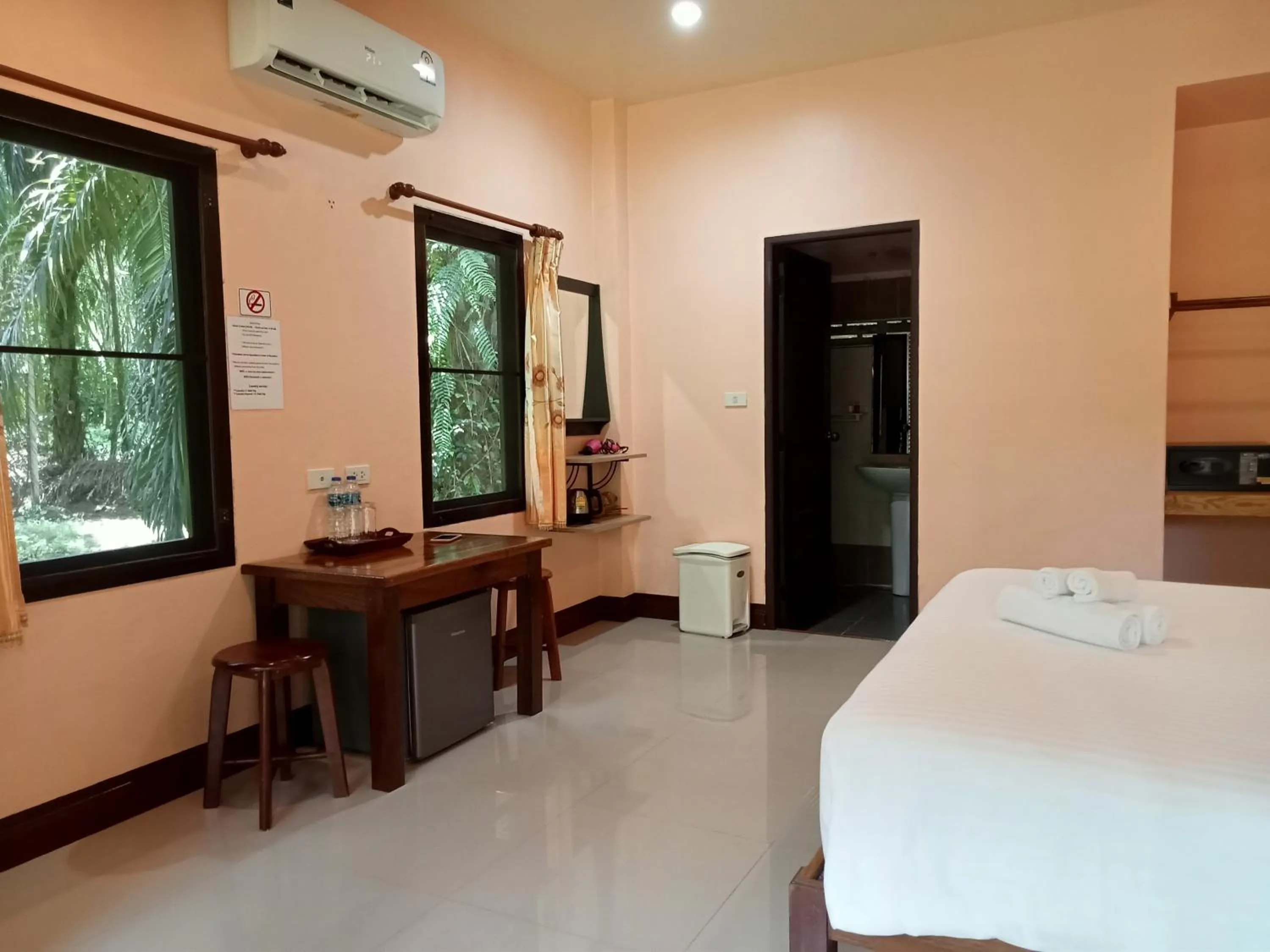 Bed in Khao Sok Palm Garden Resort