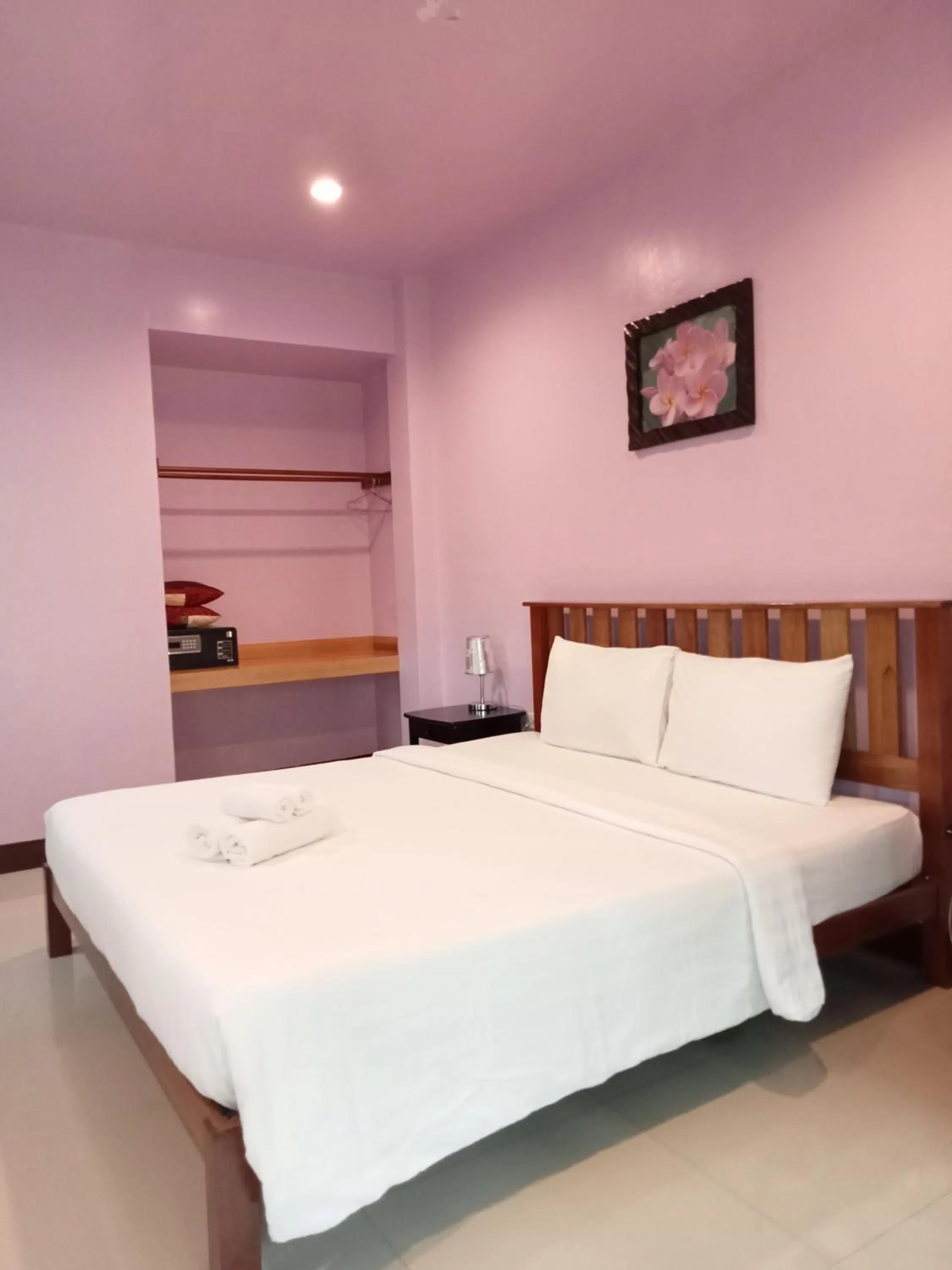 Bed in Khao Sok Palm Garden Resort