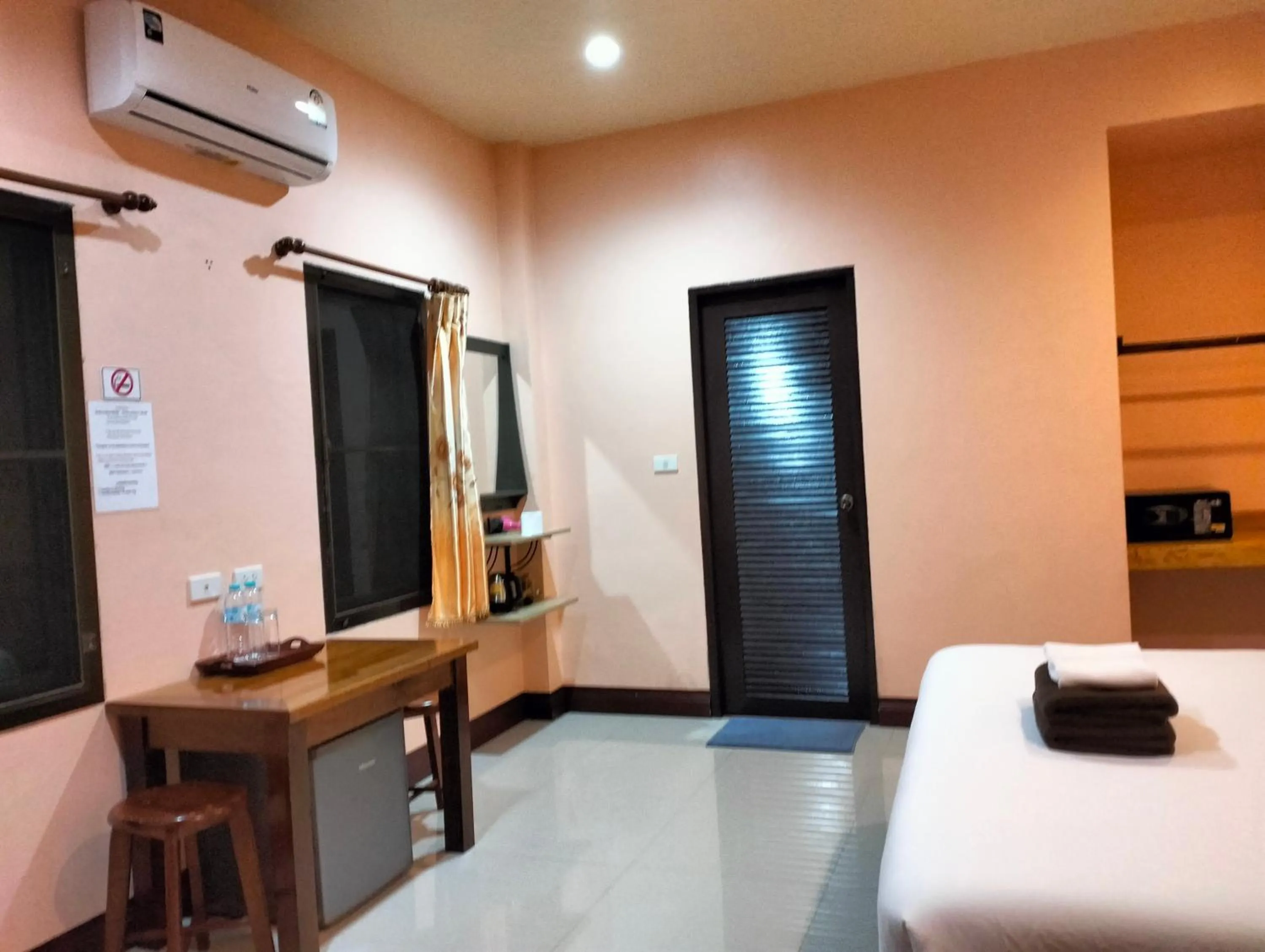 Bed in Khao Sok Palm Garden Resort