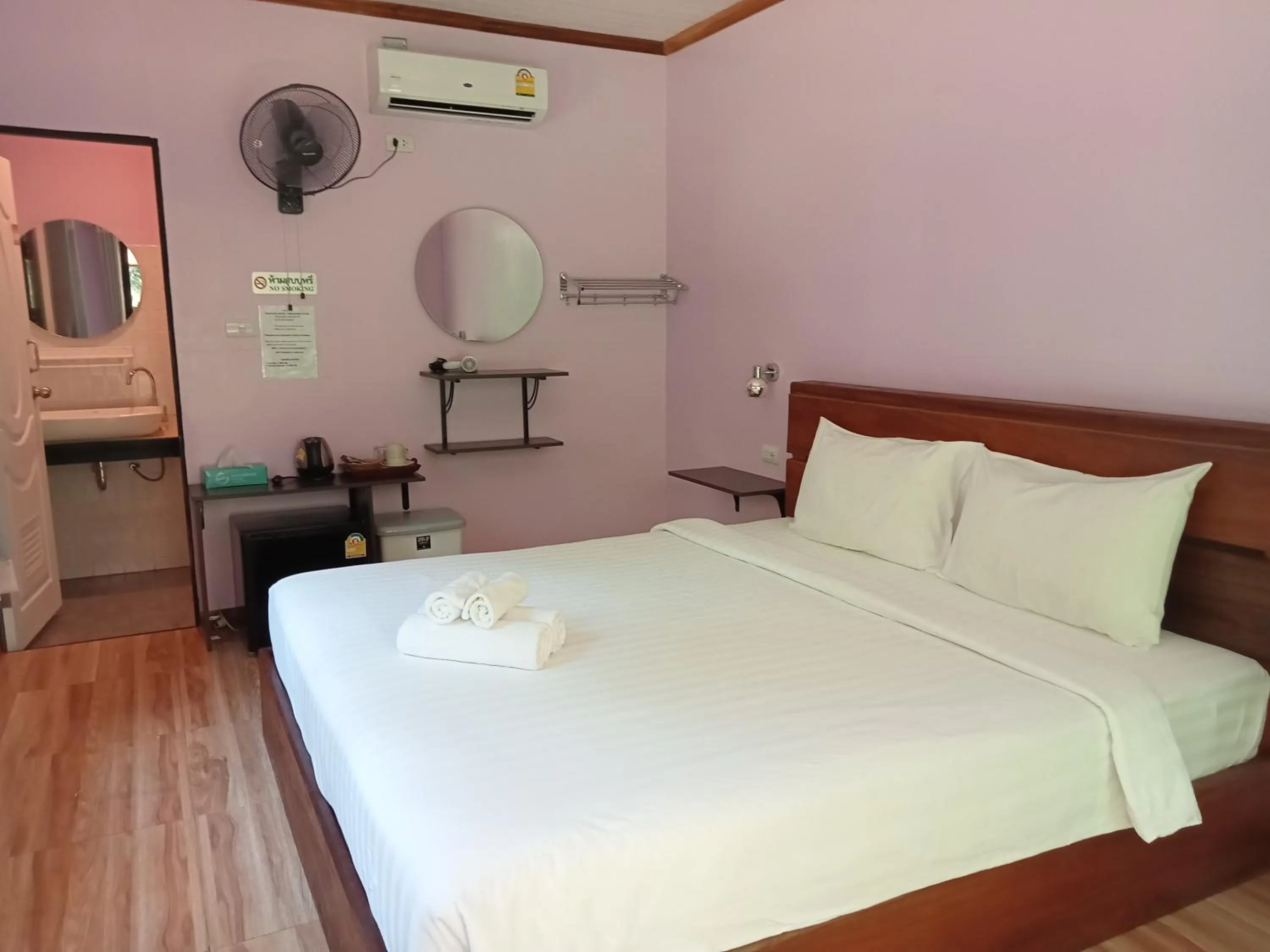 Bed in Khao Sok Palm Garden Resort