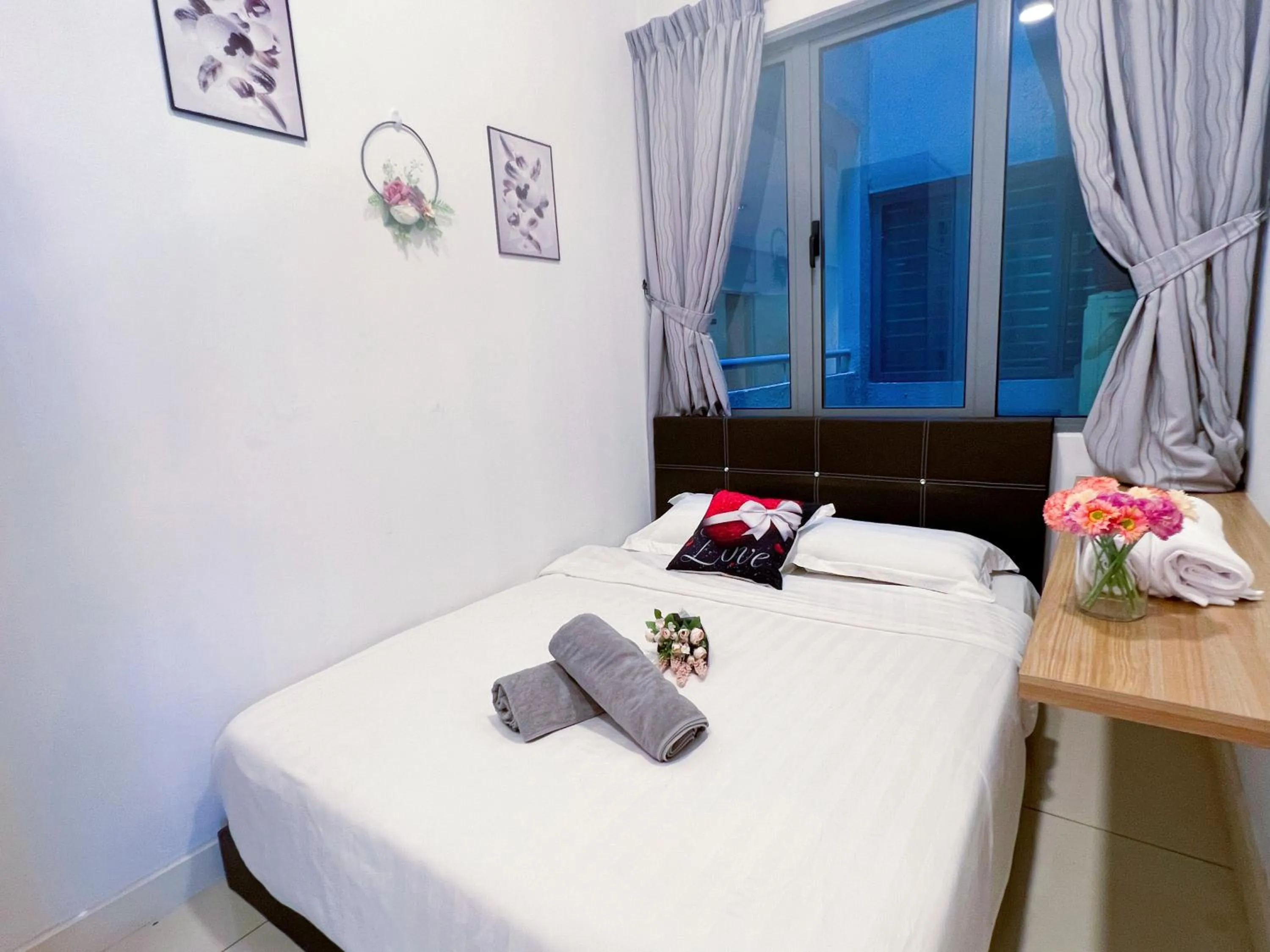 Bedroom, Bed in Haiya homestay Imago Shopping Mall 海雅民宿Imago购物 广场