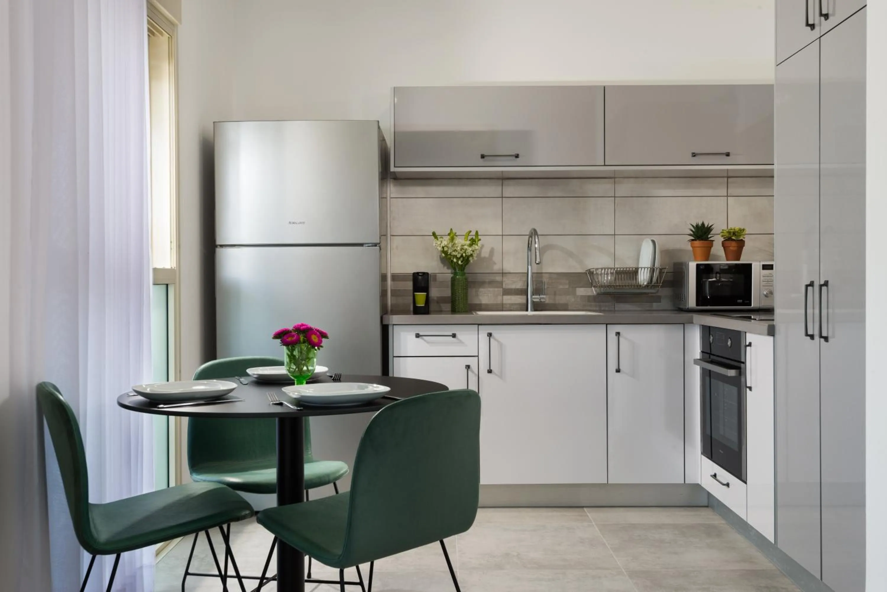 Kitchen or kitchenette in Herzl Boutique Hotel & Apartments by Domus