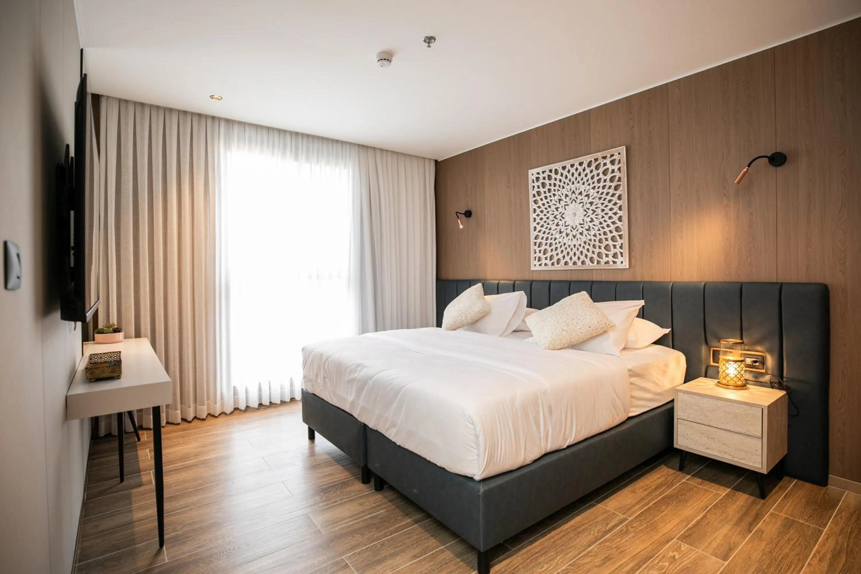 Bed in Herzl Boutique Hotel & Apartments by Domus