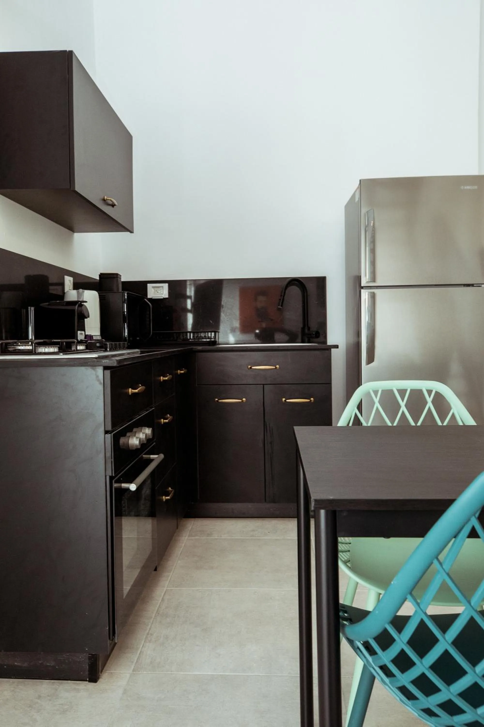 Kitchen or kitchenette in Herzl Boutique Hotel & Apartments by Domus
