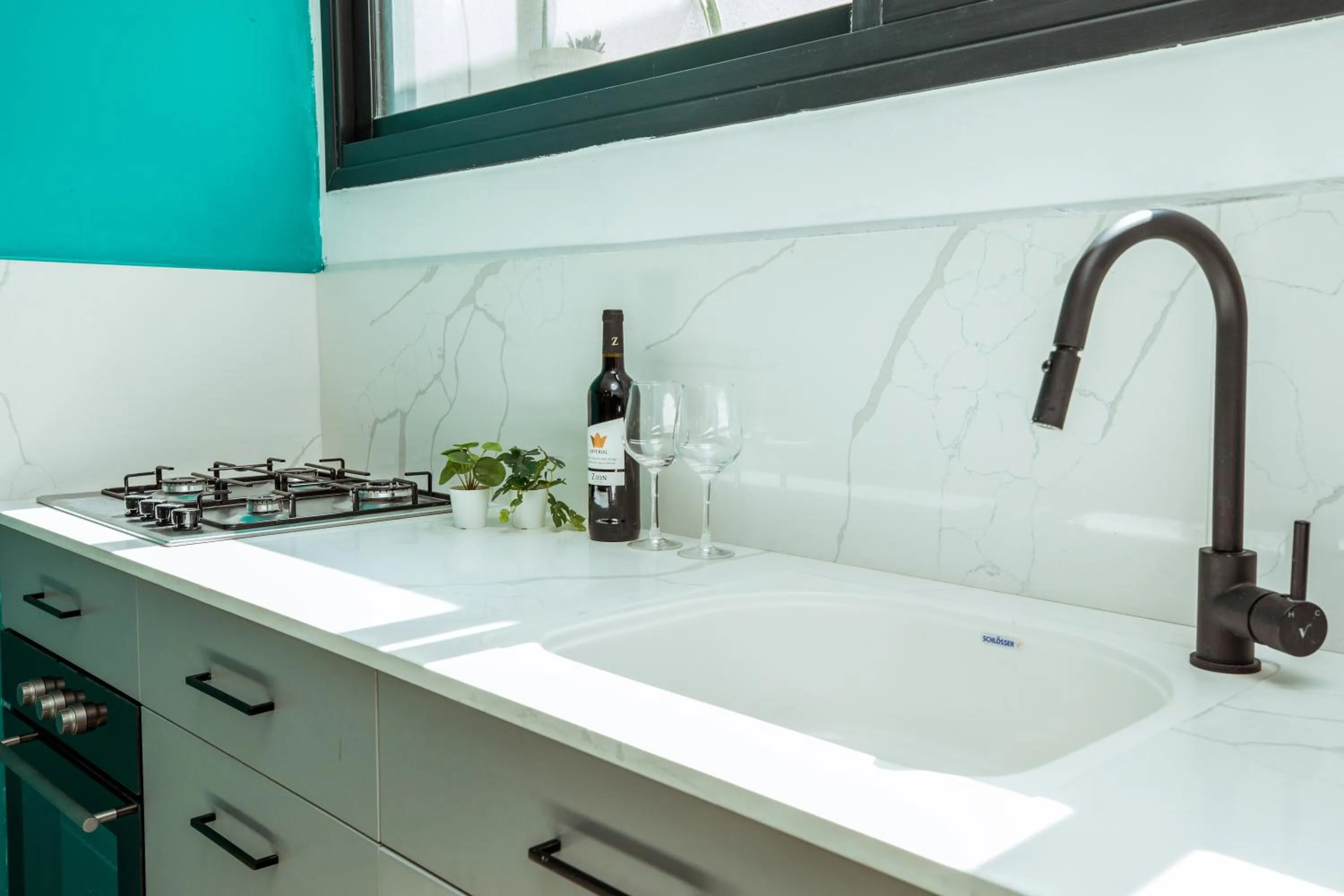 Kitchen or kitchenette in Herzl Boutique Hotel & Apartments by Domus