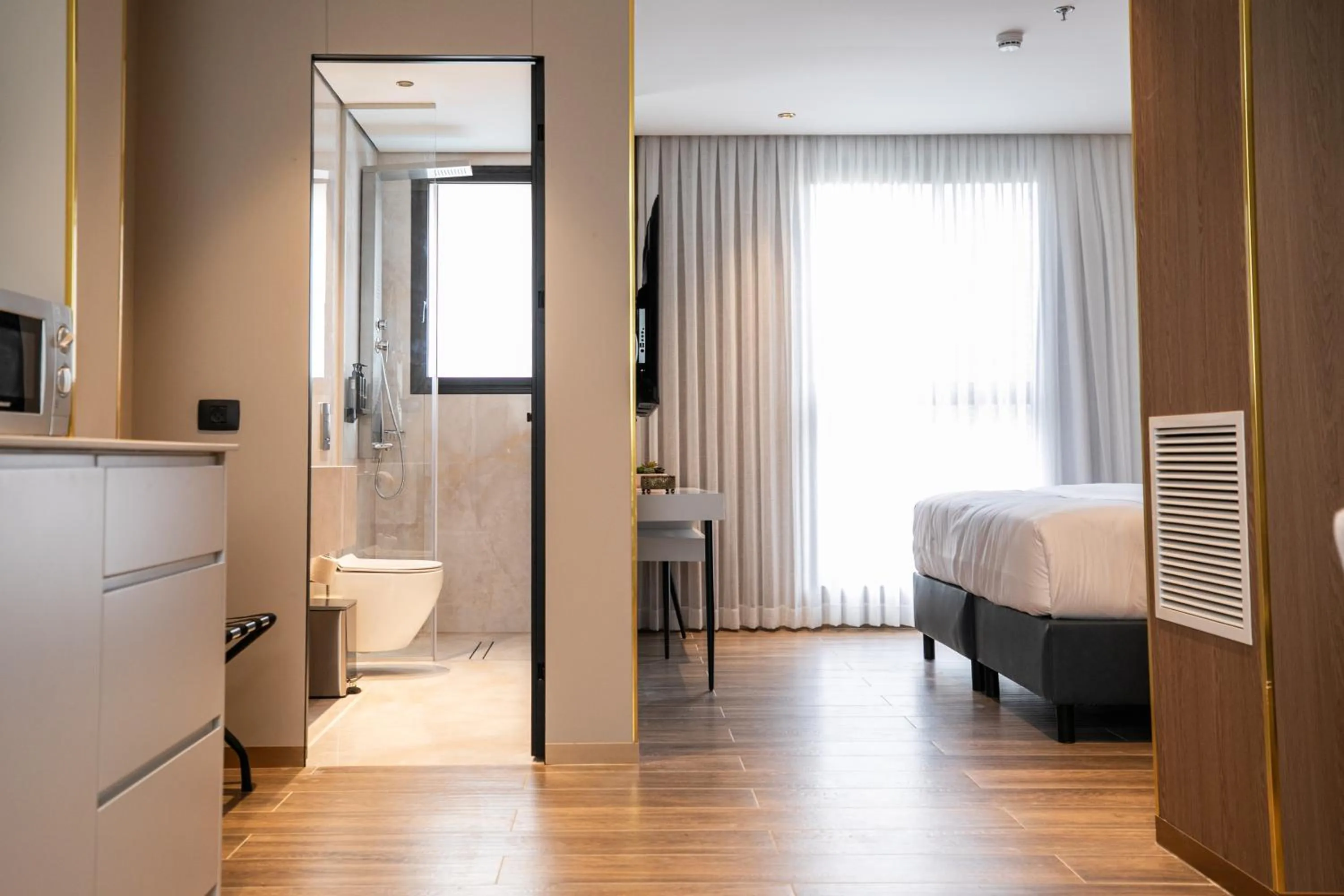 Toilet, Bed in Herzl Boutique Hotel & Apartments by Domus