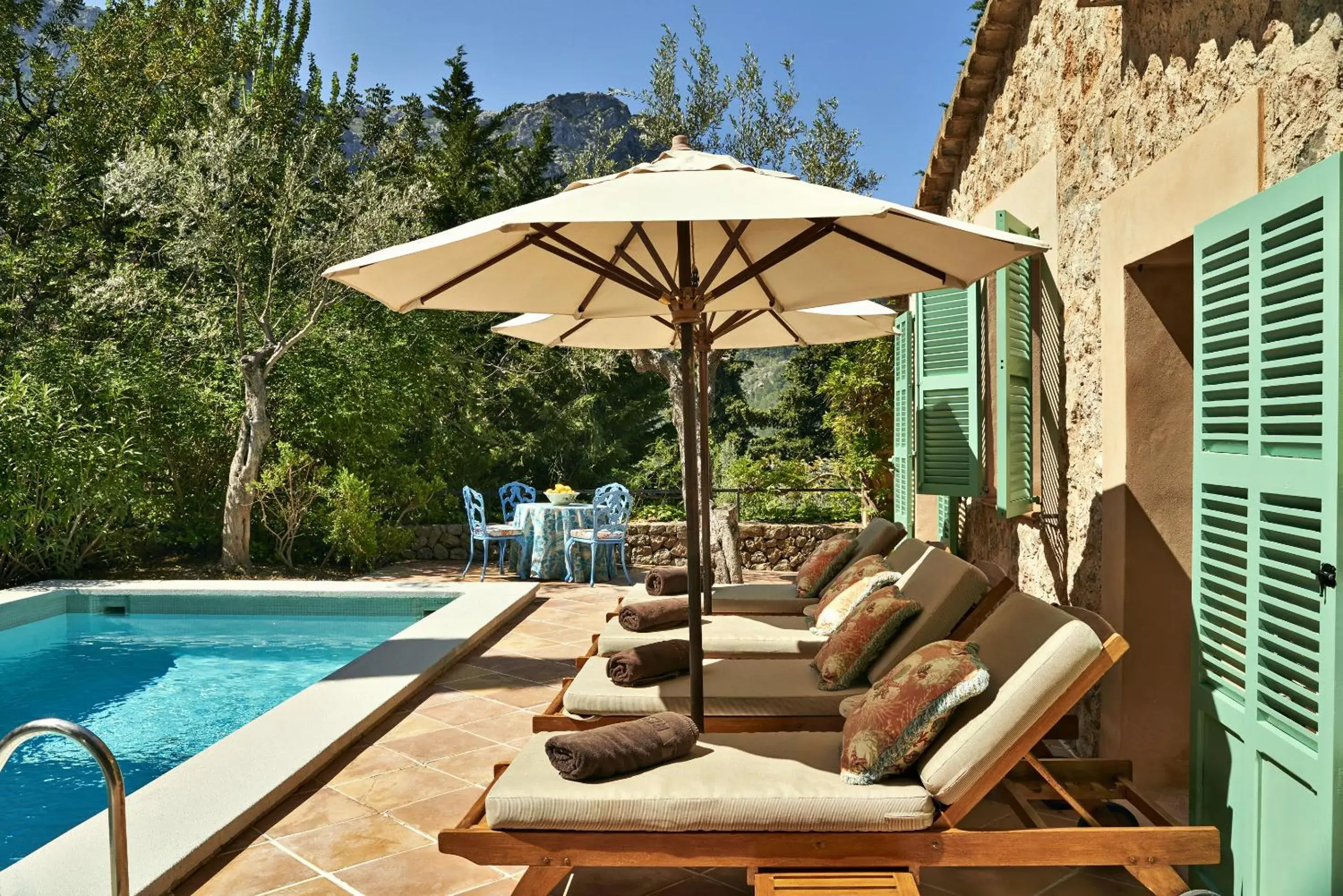 Swimming pool in La Residencia, A Belmond Hotel, Mallorca Swimming pool in La Residencia, A Belmond Hotel, Mallorca
