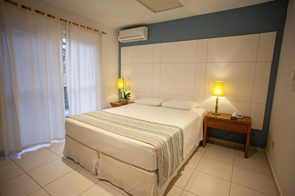 Photo of the whole room, Bed in Juquehy Praia Hotel