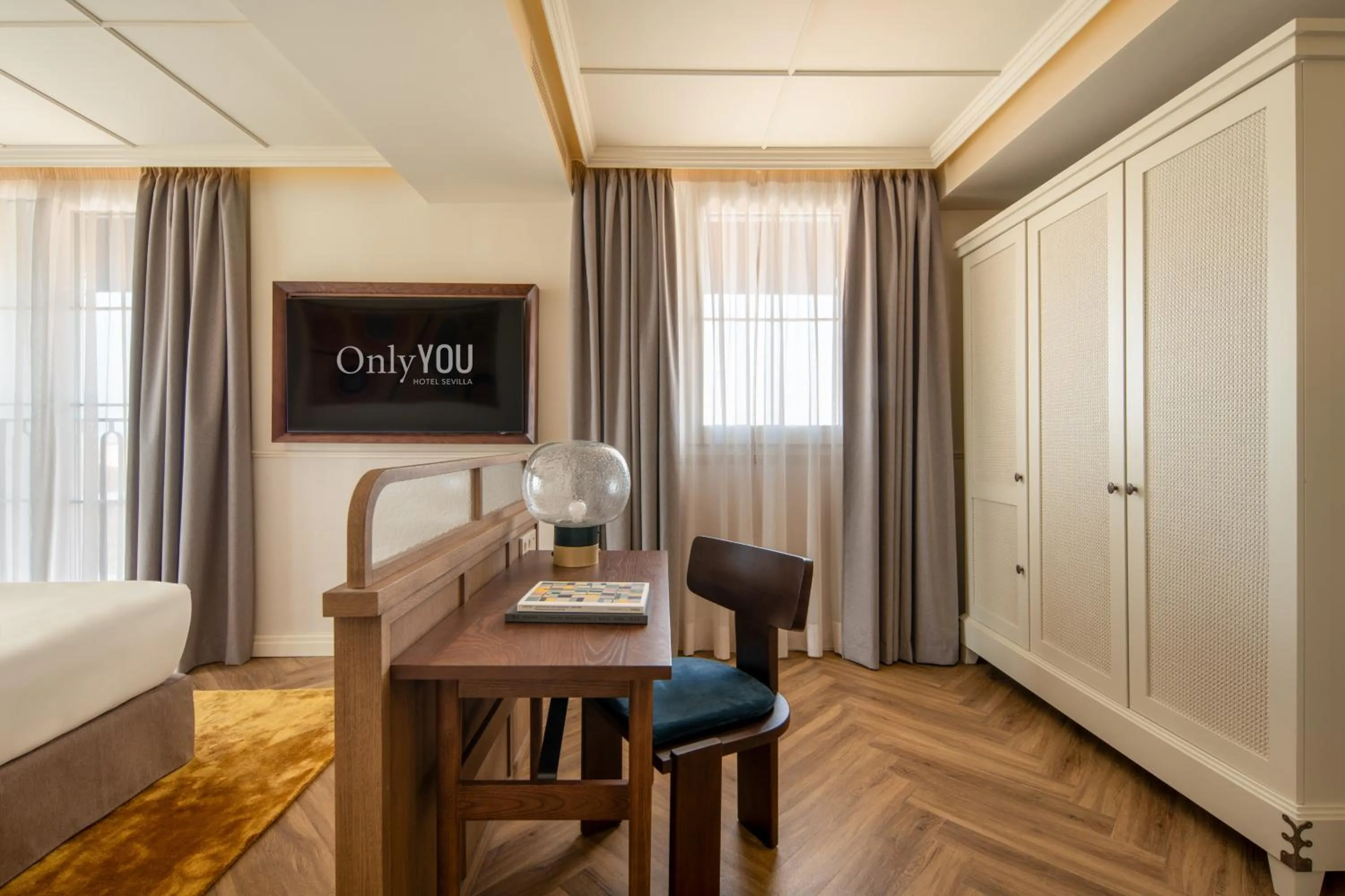 Seating area, Bed in Only YOU Hotel Sevilla