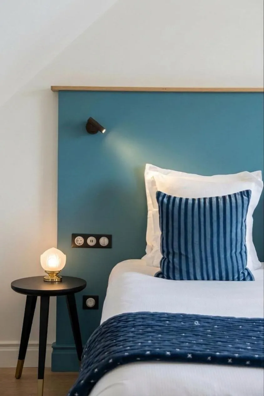 Bed in L'INVITATION AU VOYAGE - Hôtel & Spa