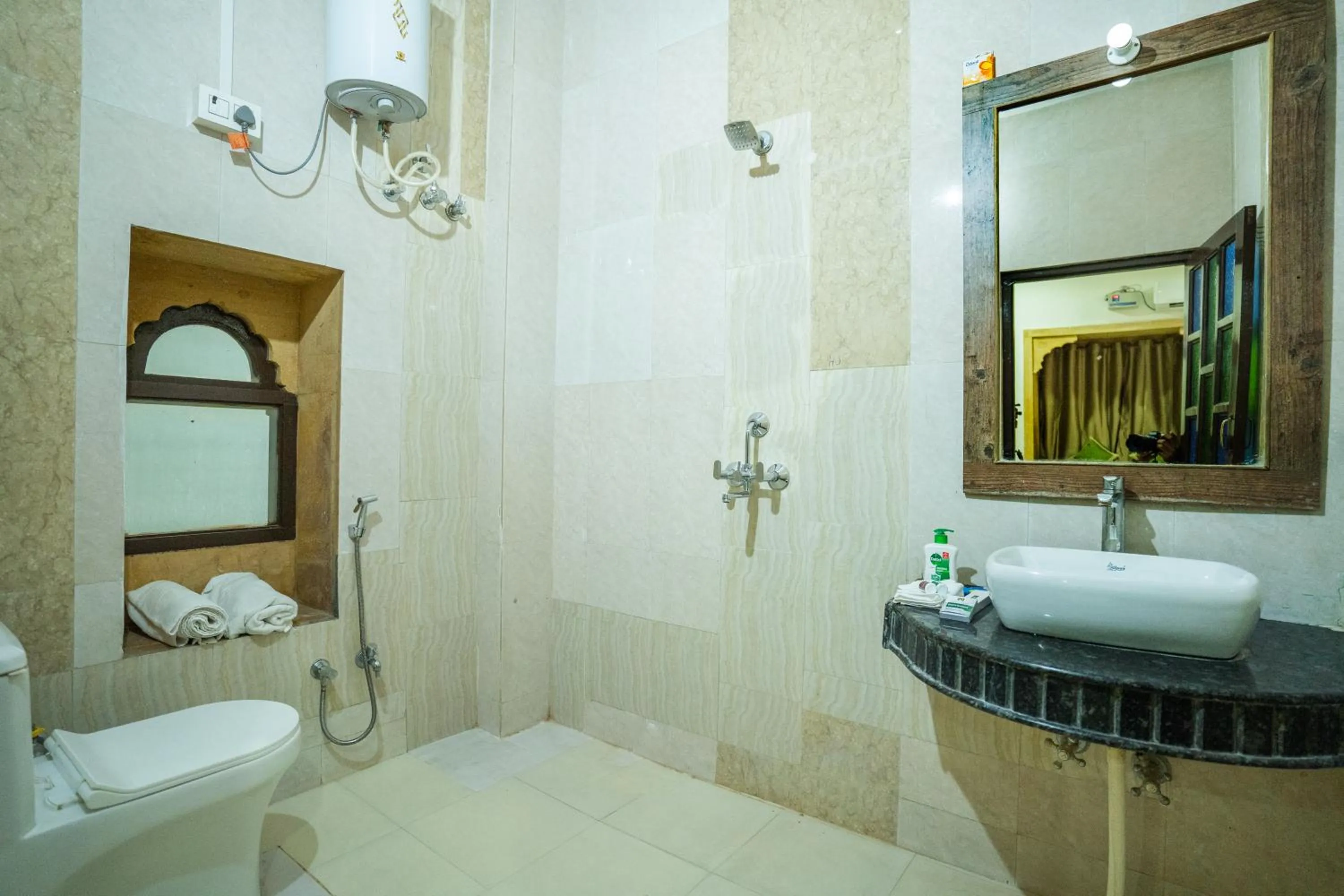 Shower in Hotel Marina Mahal with Swimming Pool