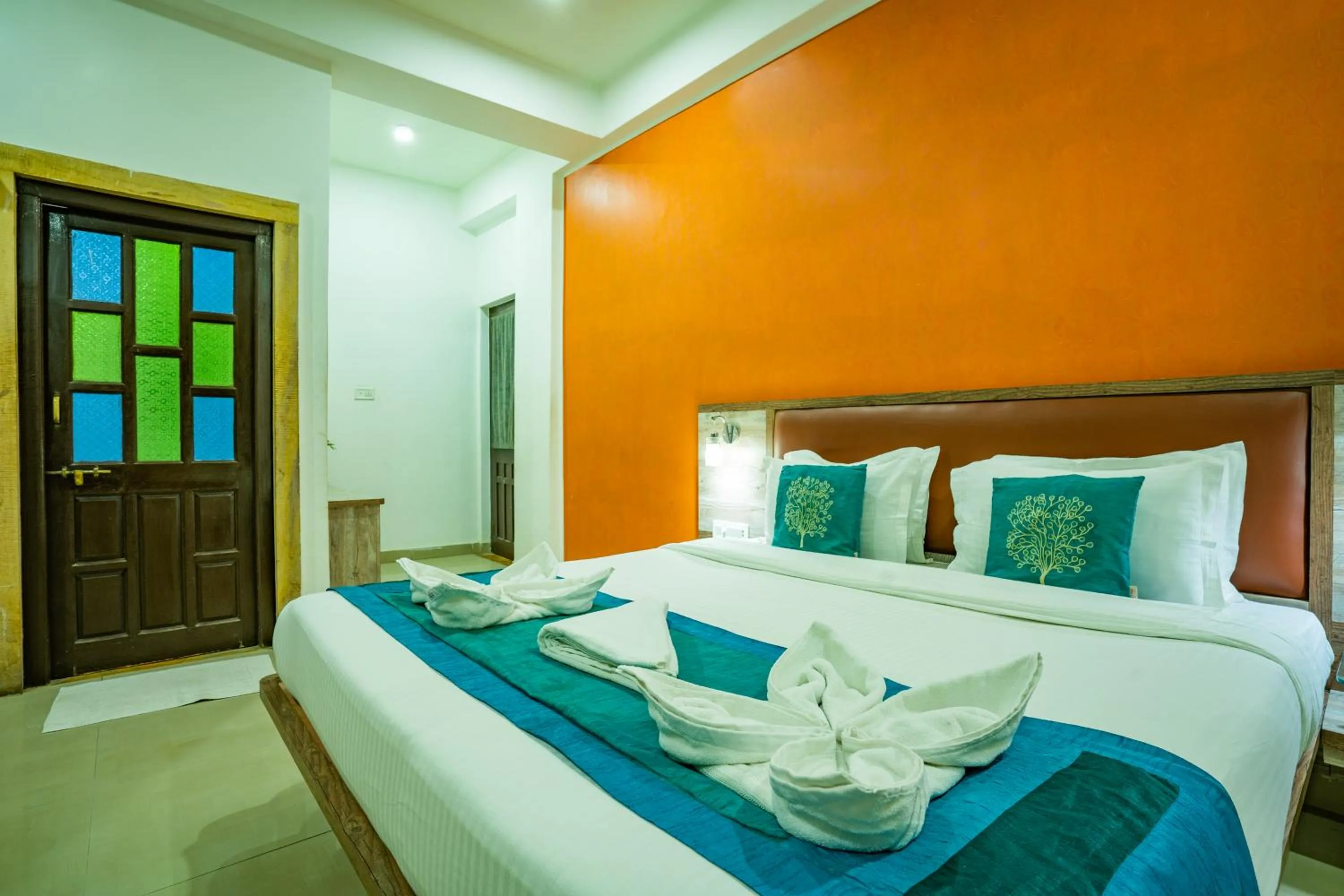 Bed in Hotel Marina Mahal with Swimming Pool