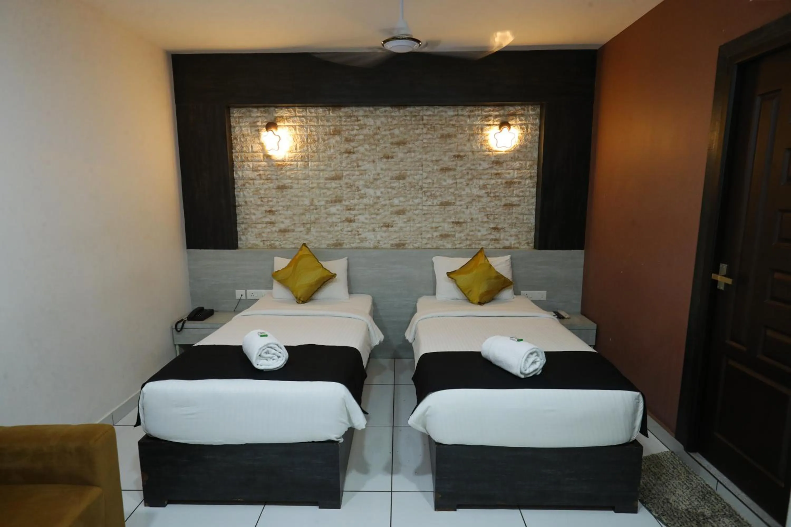 Bed in D-Green Hotels