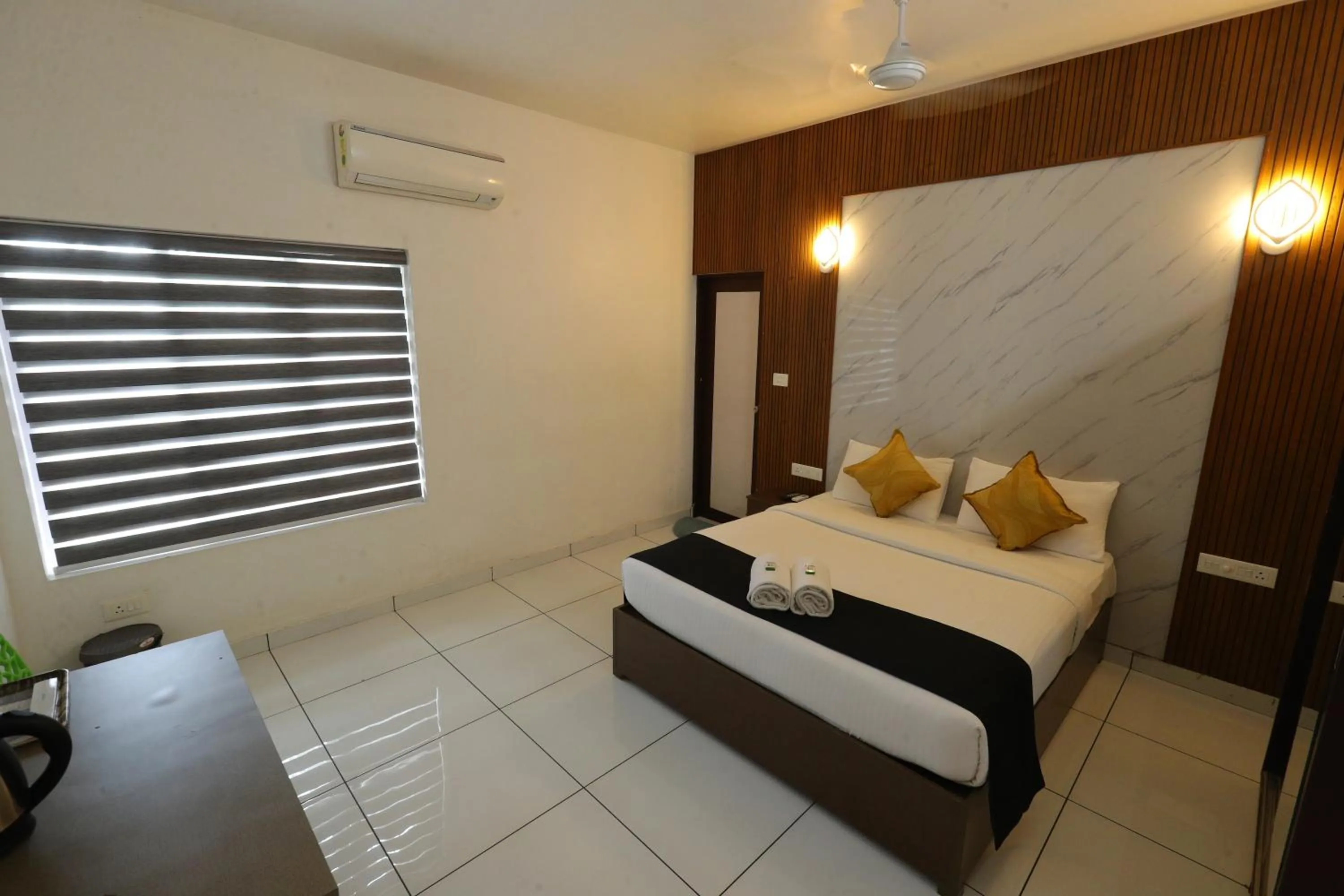 Bed in D-Green Hotels