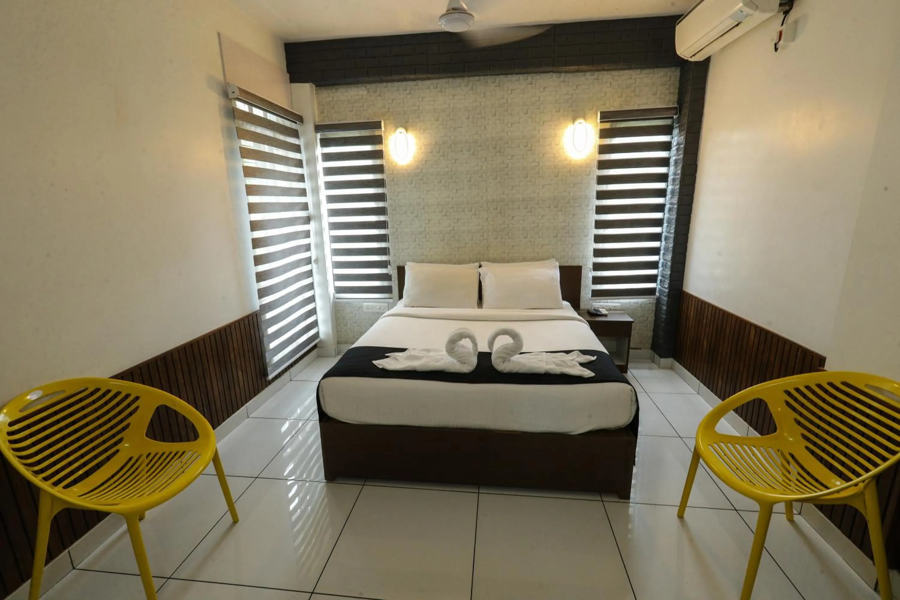 Bed in D-Green Hotels