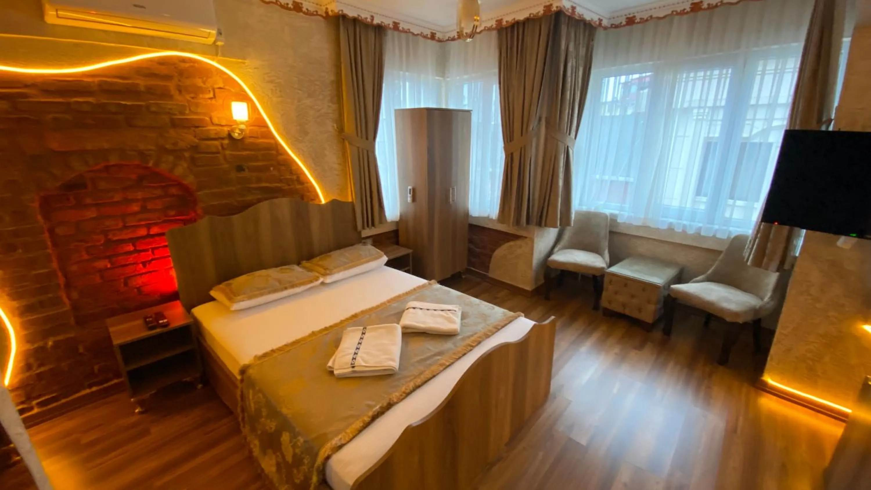 Bed in GOLDEN ARROW OLD CİTY HOTEL