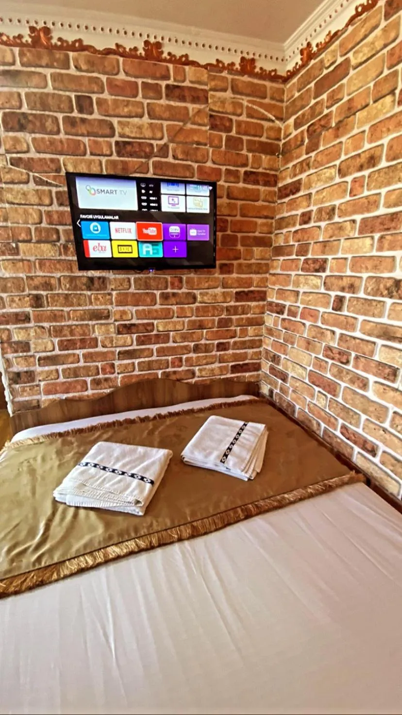 Bed in GOLDEN ARROW OLD CİTY HOTEL