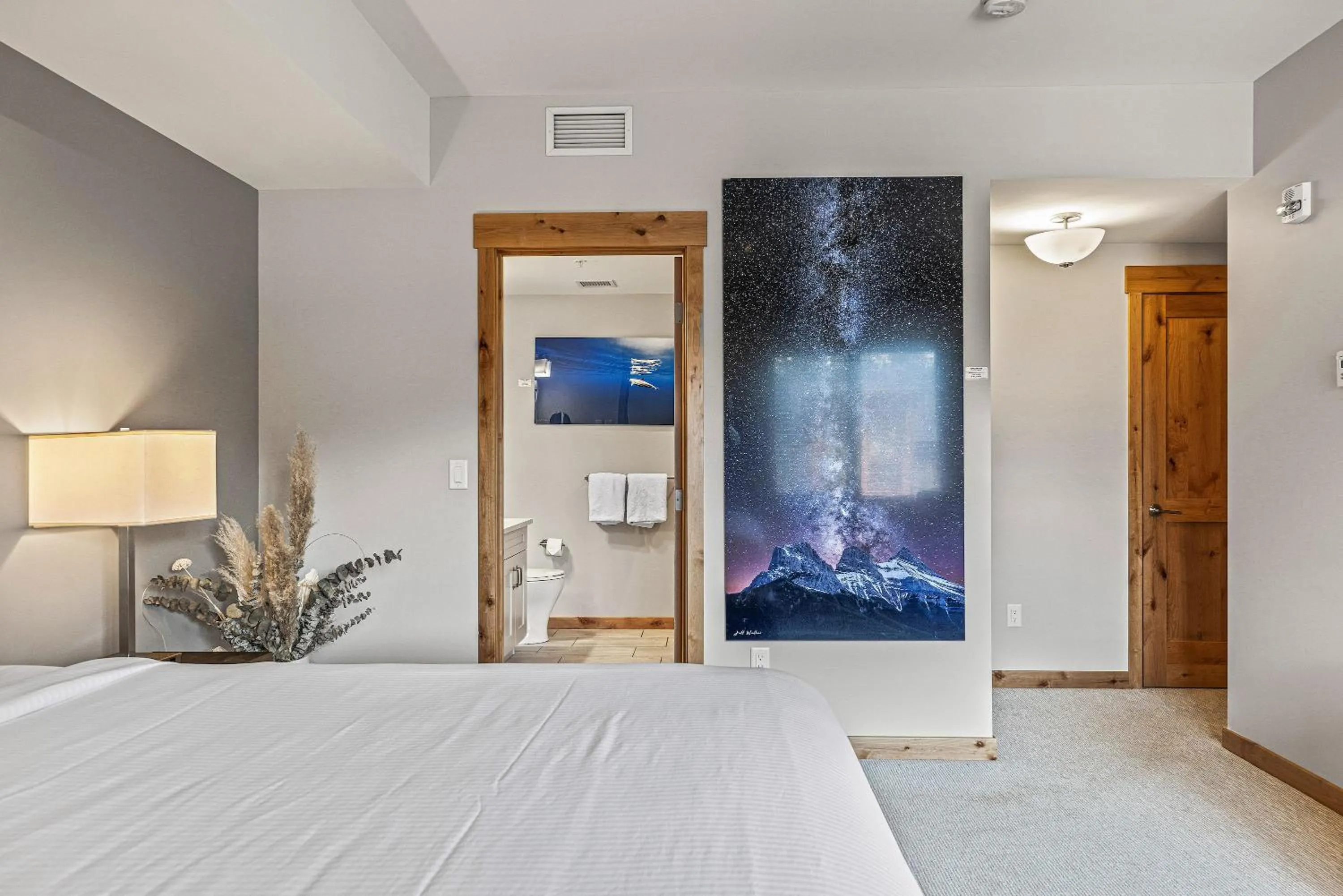 Bed in Spring Creek Condo by Canadian Rockies Vacation Rentals