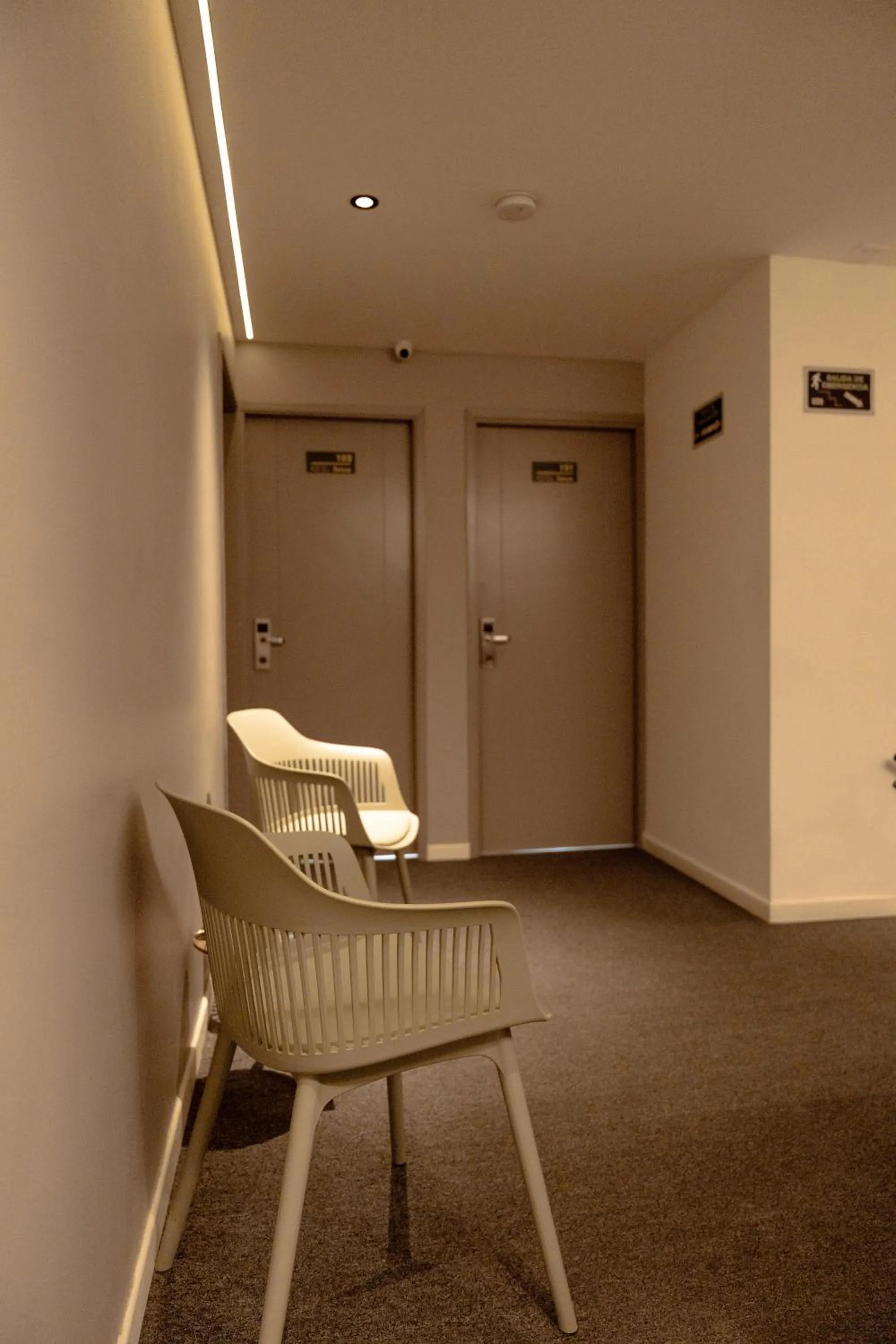 Seating area in Fence by Bernalo Hotels