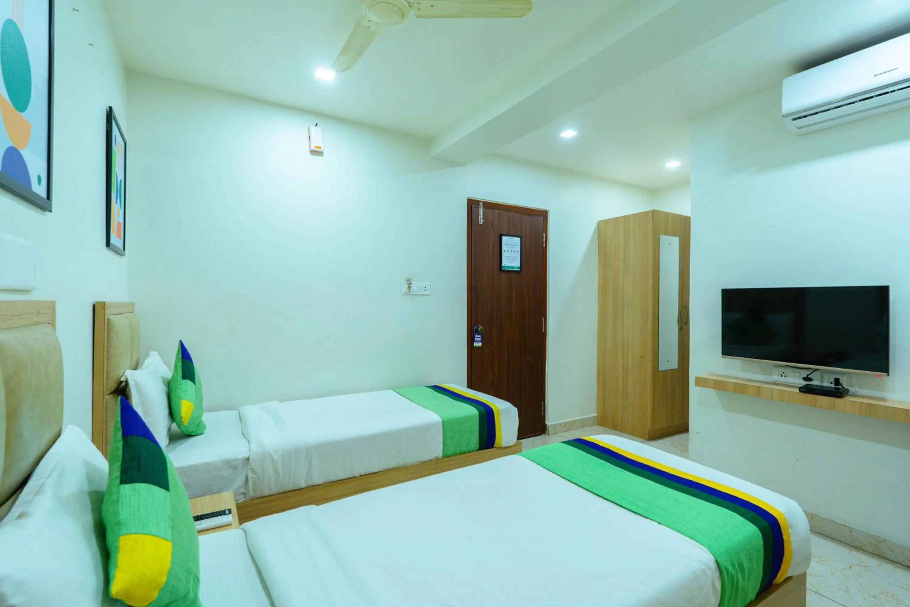 Bedroom, Bed in Treebo Elmas Grand