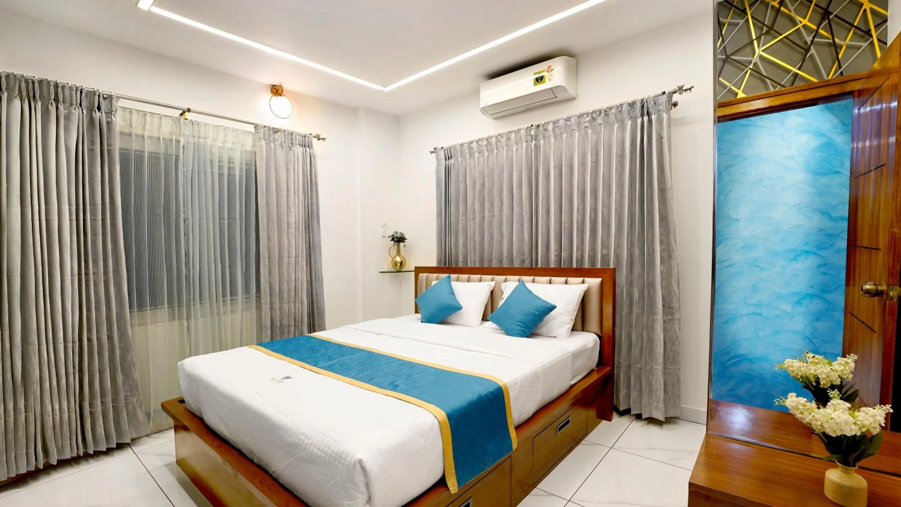 Bed in Royal Tusker Luxury Service Apartments