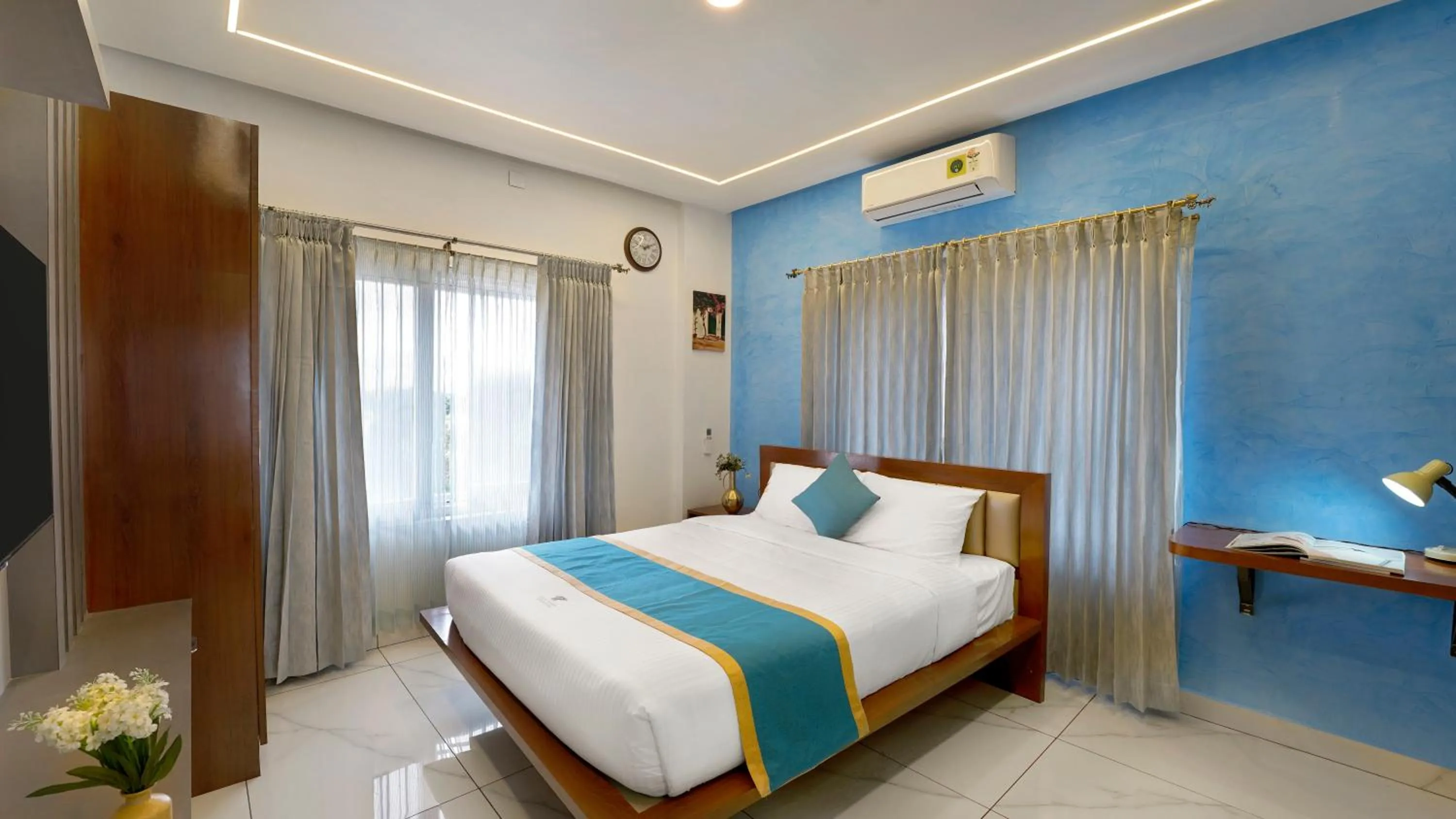 Bed in Royal Tusker Luxury Service Apartments