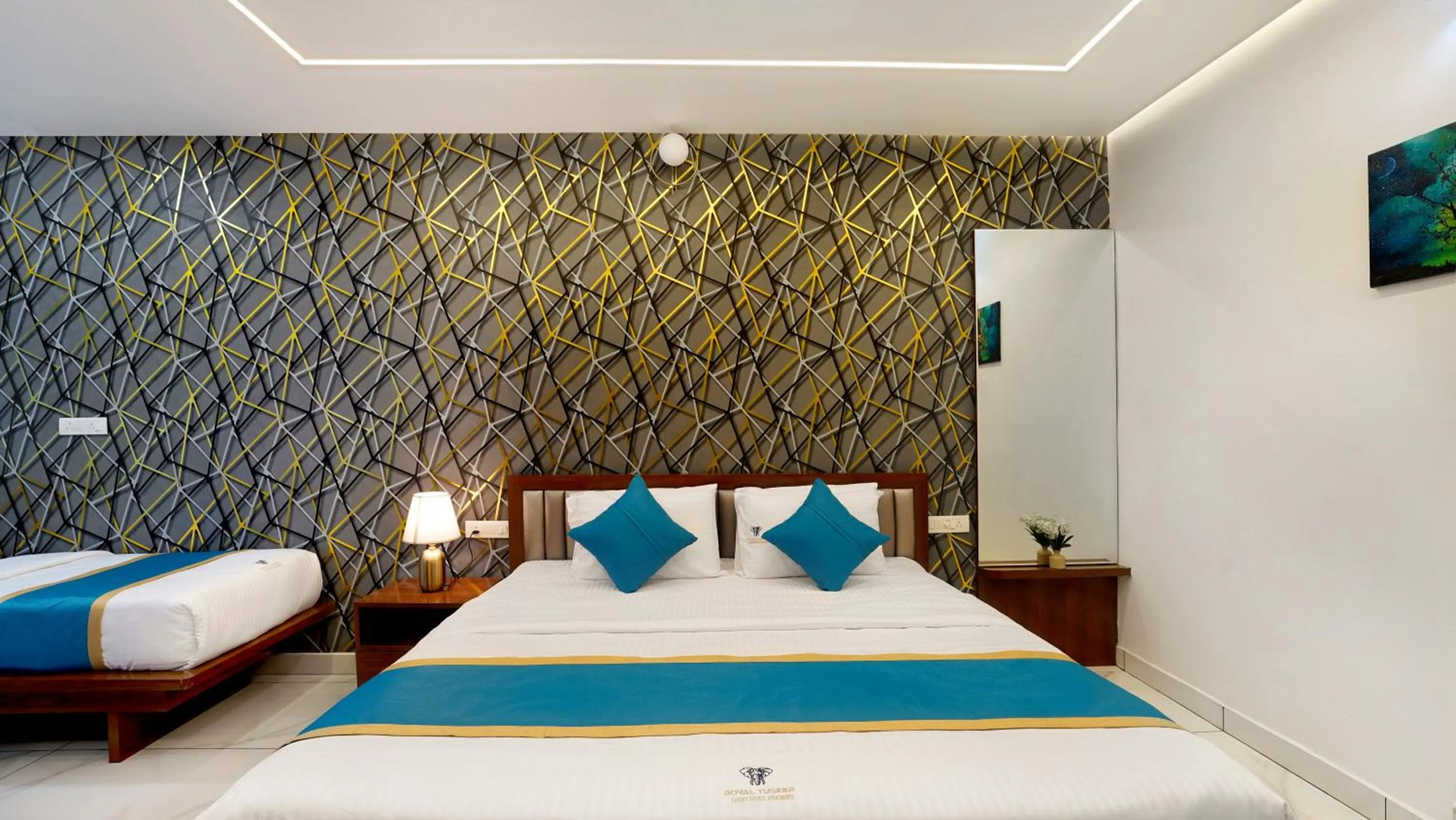 Bed in Royal Tusker Luxury Service Apartments