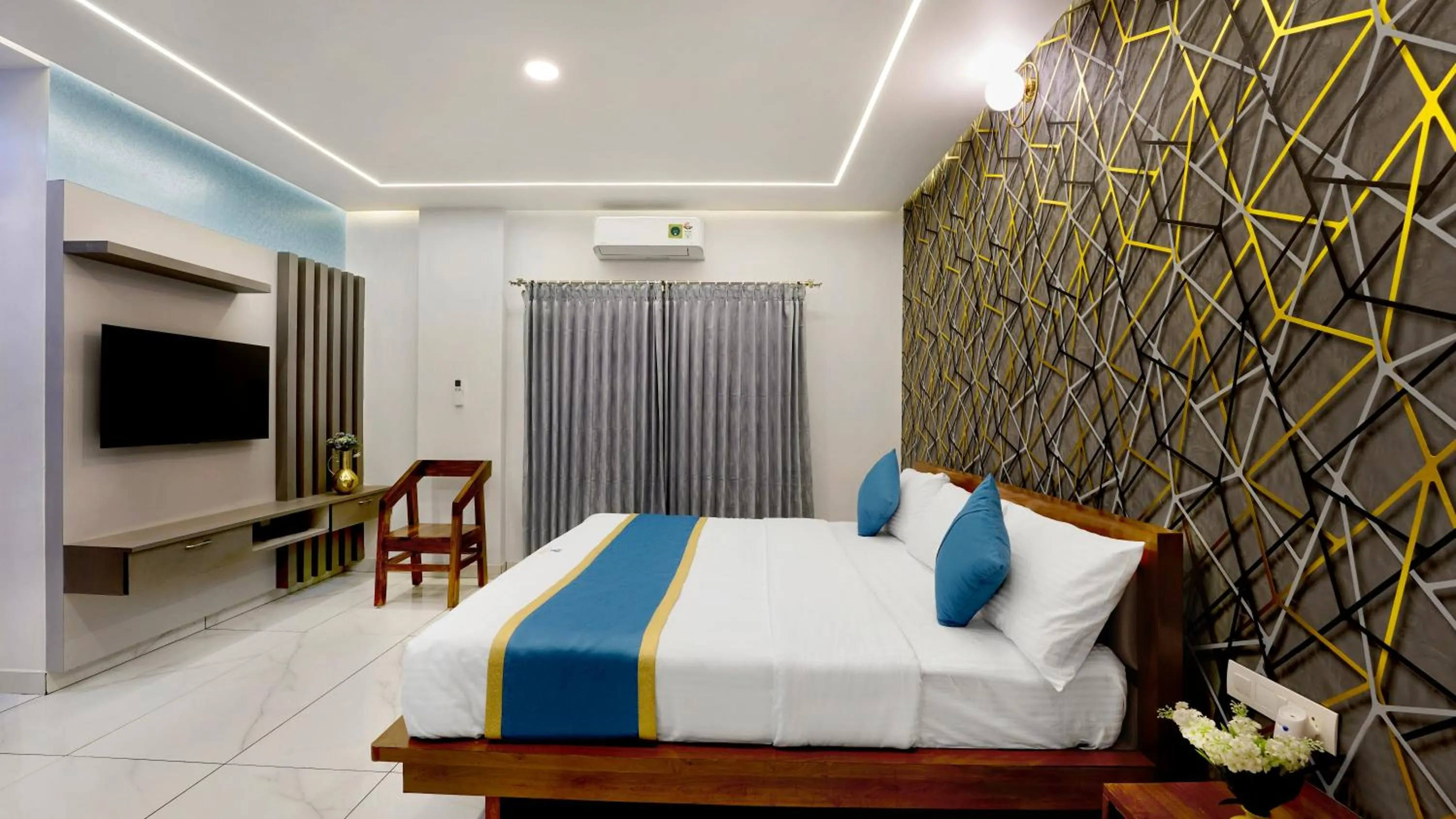 Bed in Royal Tusker Luxury Service Apartments