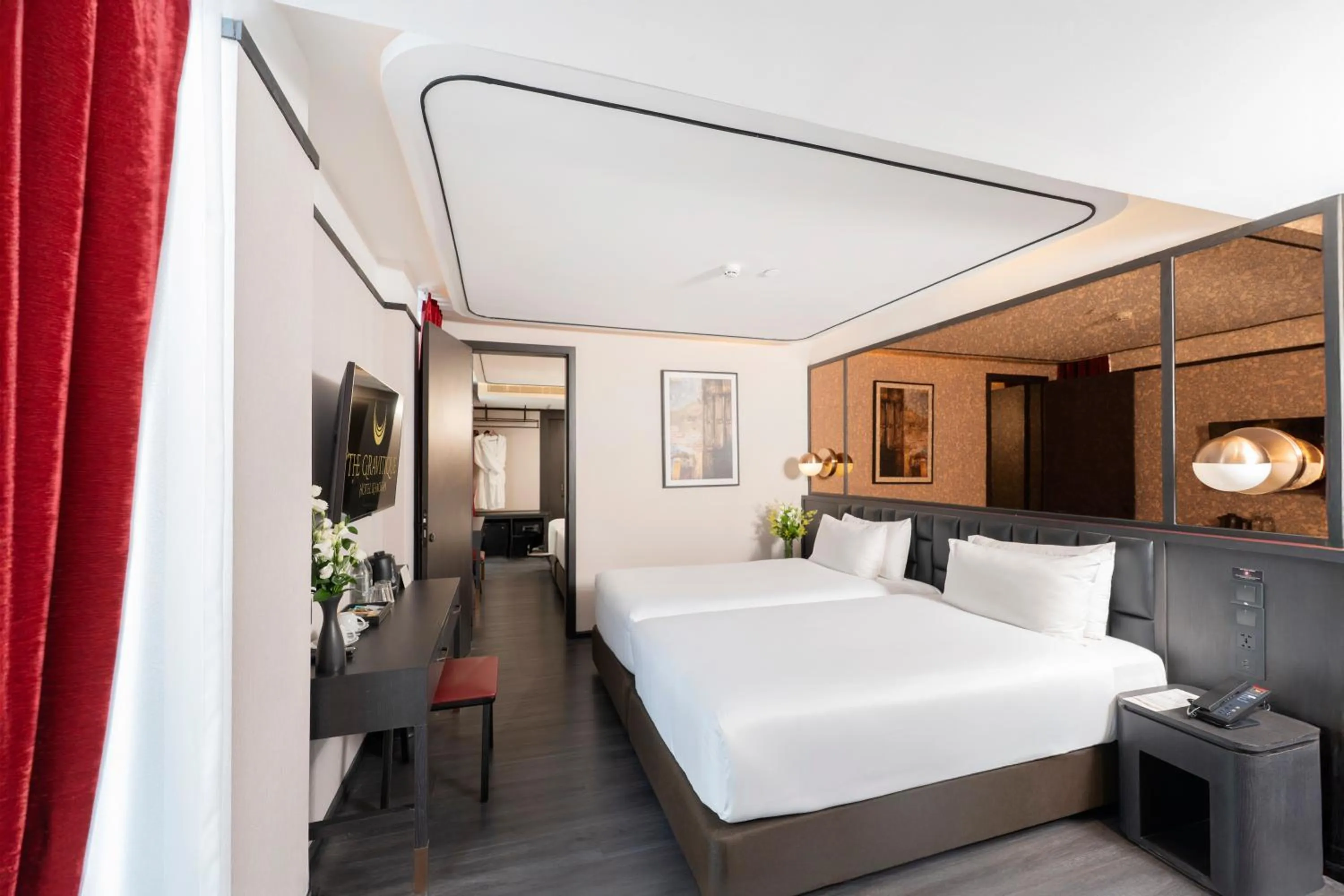 Bed in The Gravitique Hotel Khaosan