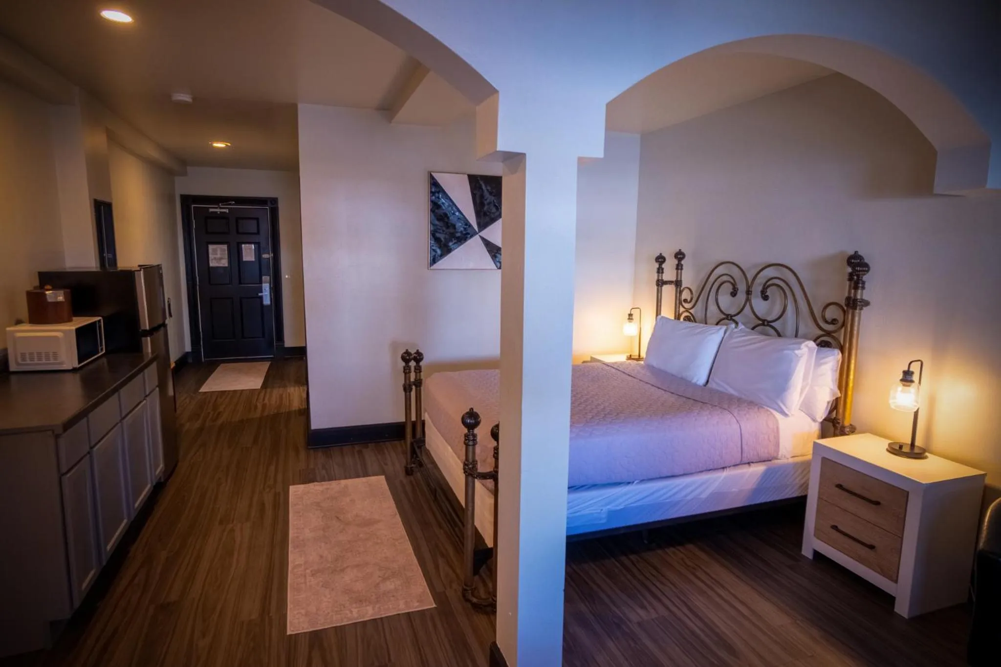 Photo of the whole room, Bed in Nuk's Executive Suites