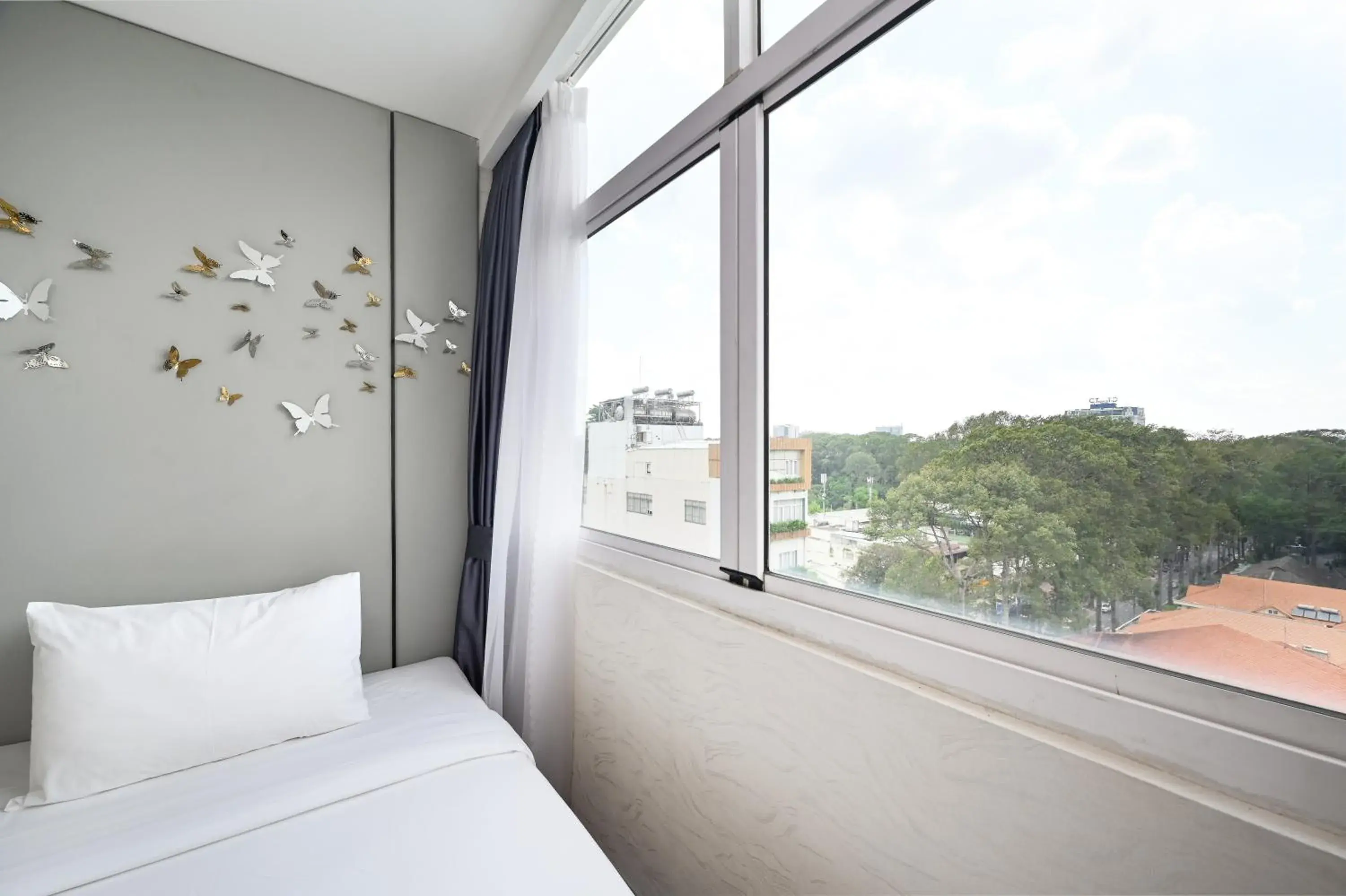 Balcony/Terrace, Bed in California Saigon Hotel & Rooftop Pool Balcony/Terrace, Bed in California Saigon Hotel & Rooftop Pool