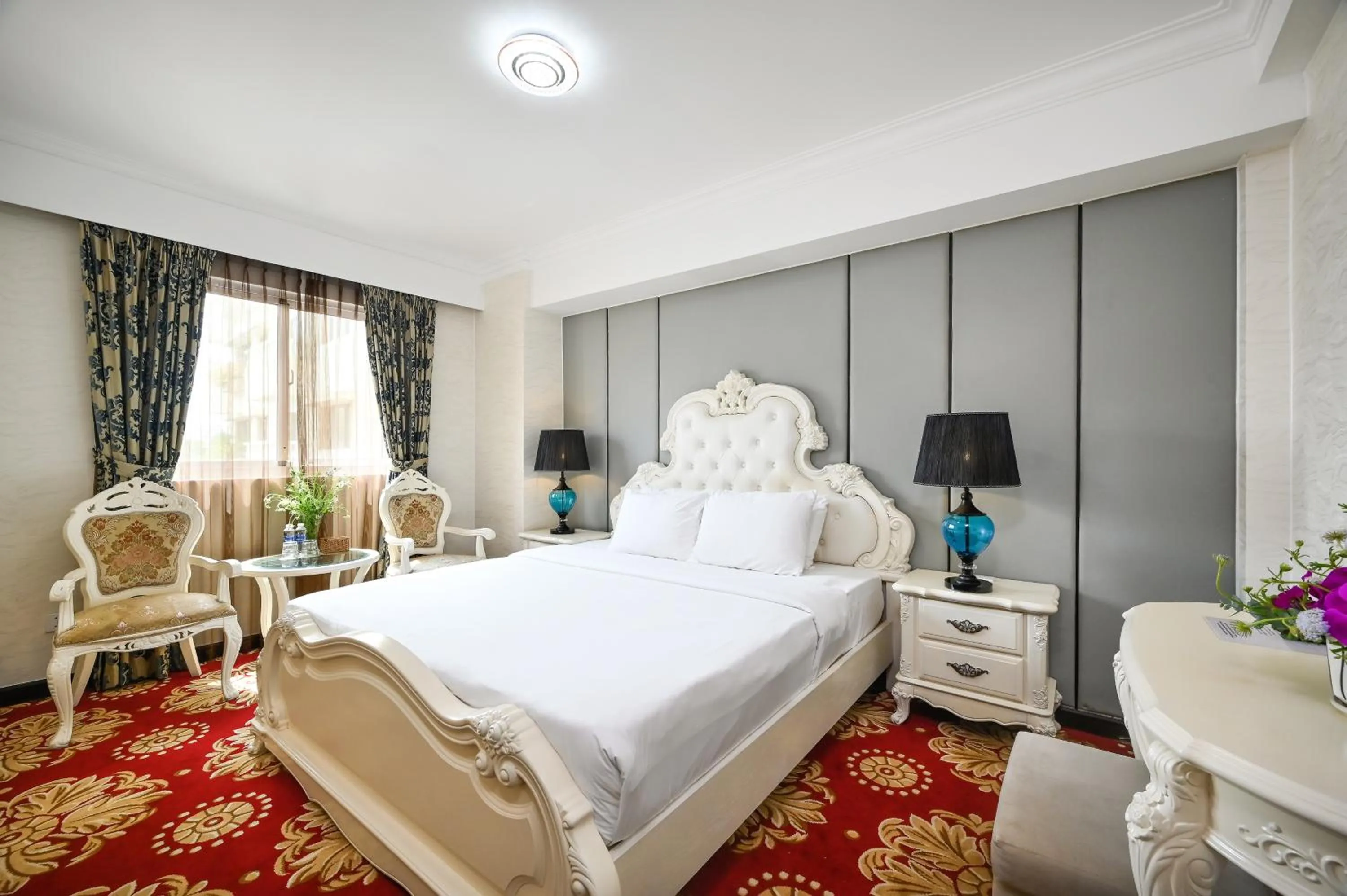 Bed in California Saigon Hotel & Rooftop Pool