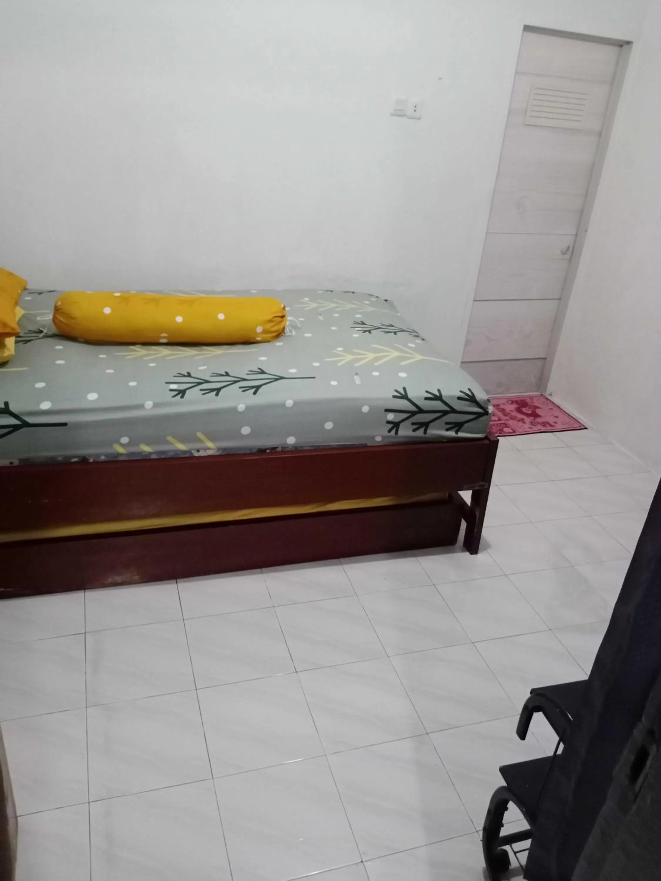Bedroom in SPOT ON 91597 Sharie Homestay Syariah