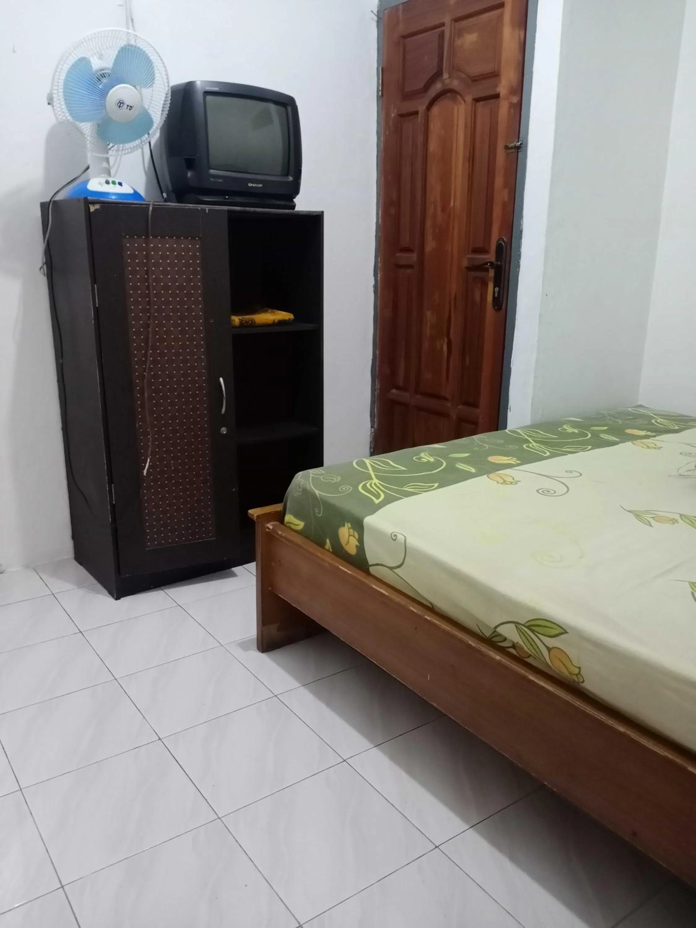 Bedroom in SPOT ON 91597 Sharie Homestay Syariah
