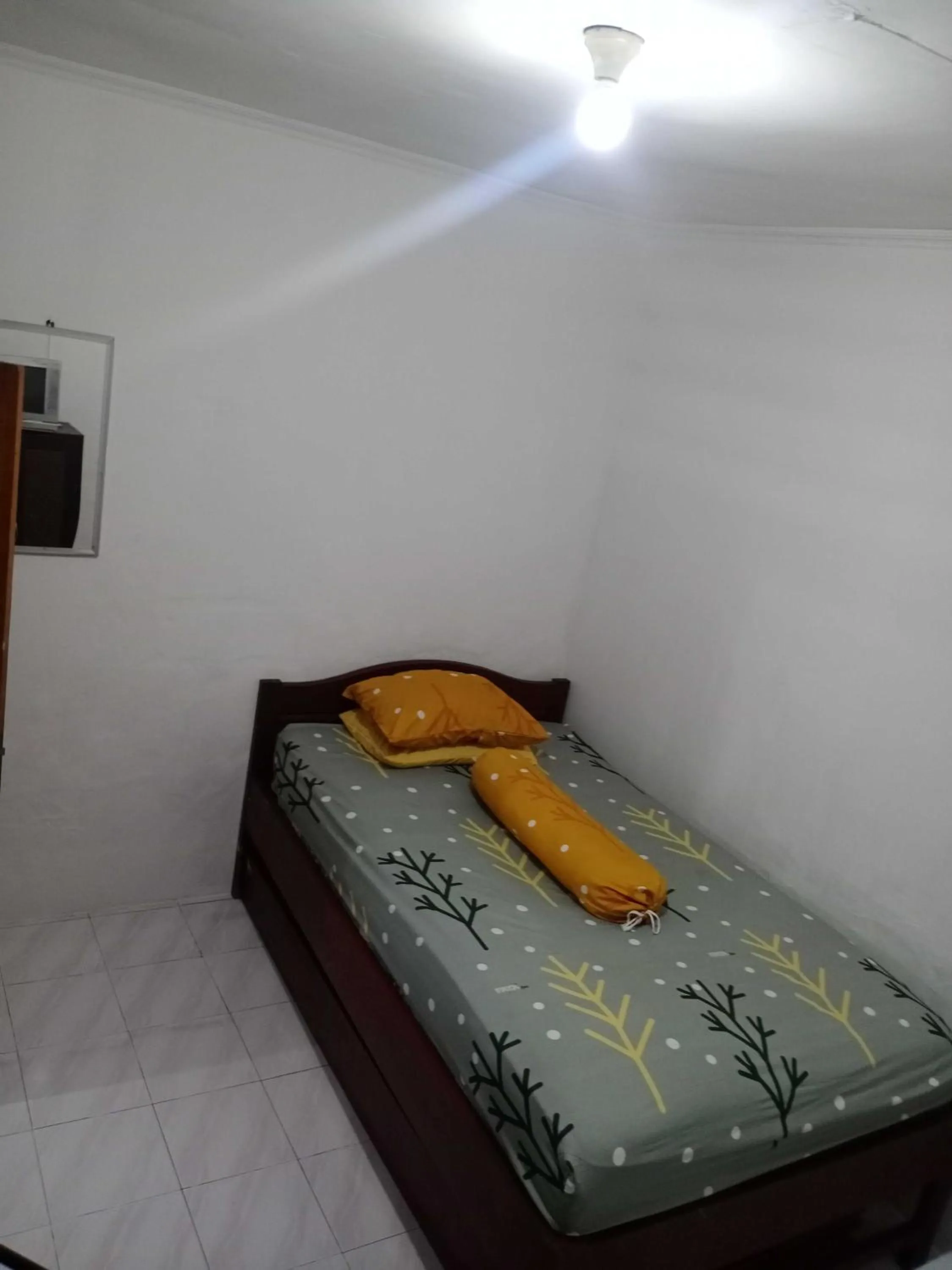Bedroom in SPOT ON 91597 Sharie Homestay Syariah