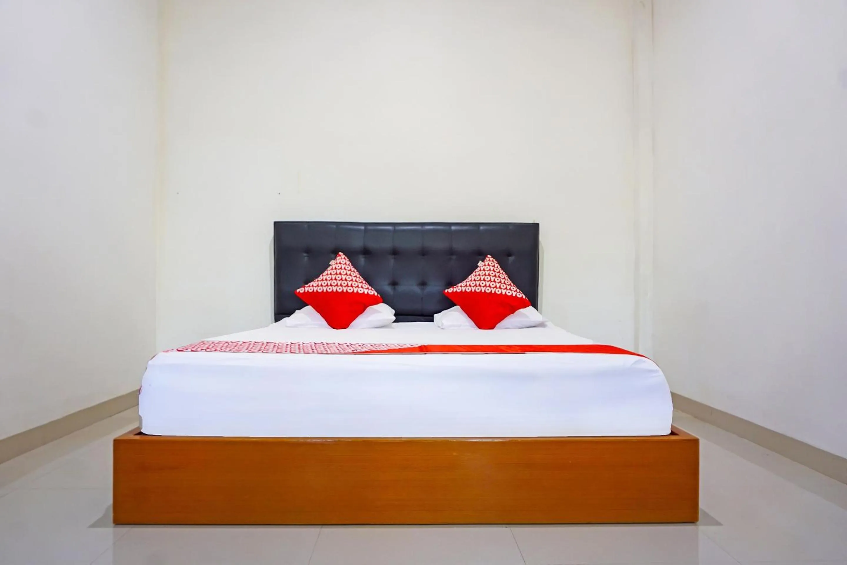 Bedroom in Hotel O Homestay Anitha Syariah Makassar