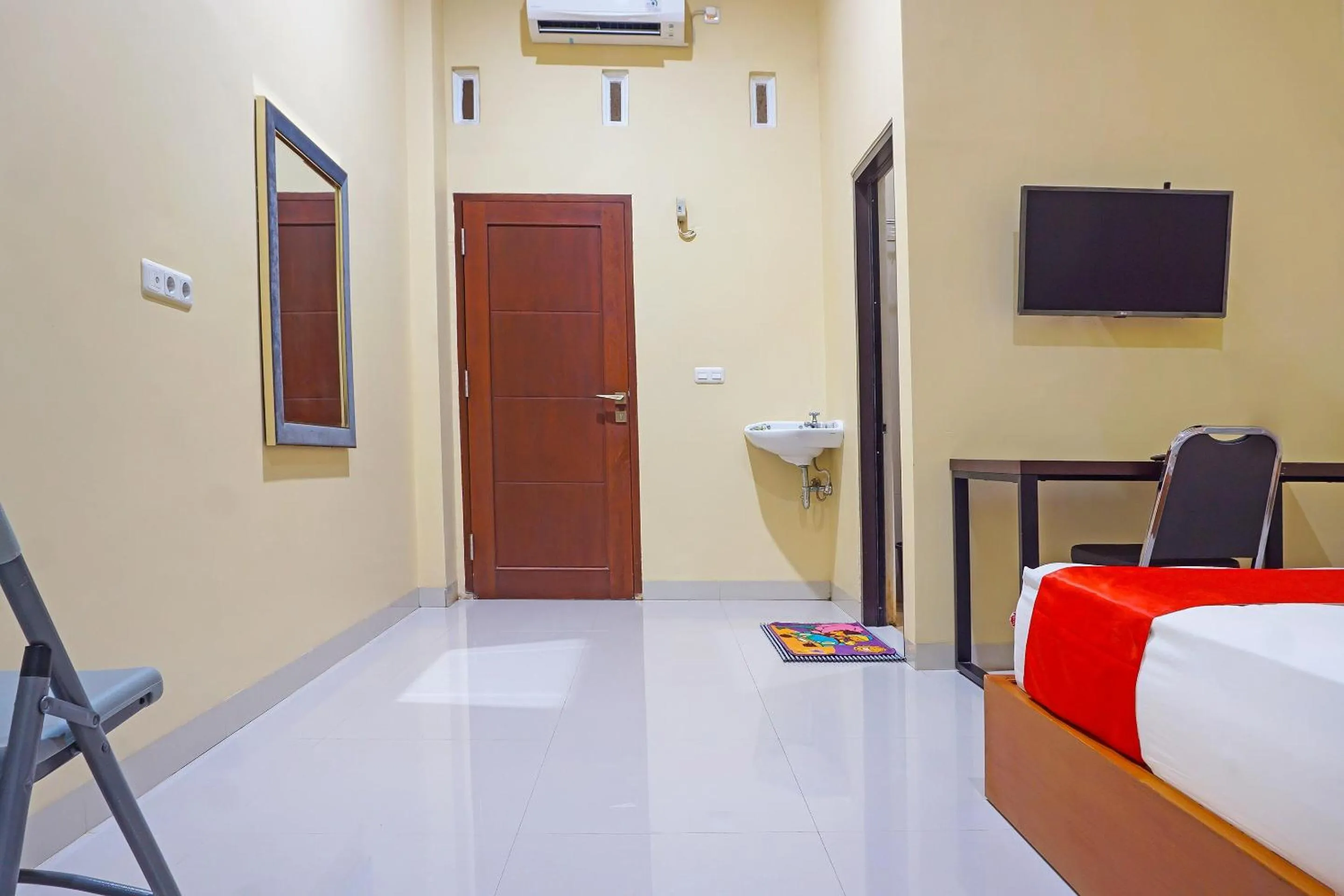 Bedroom in Hotel O Homestay Anitha Syariah Makassar