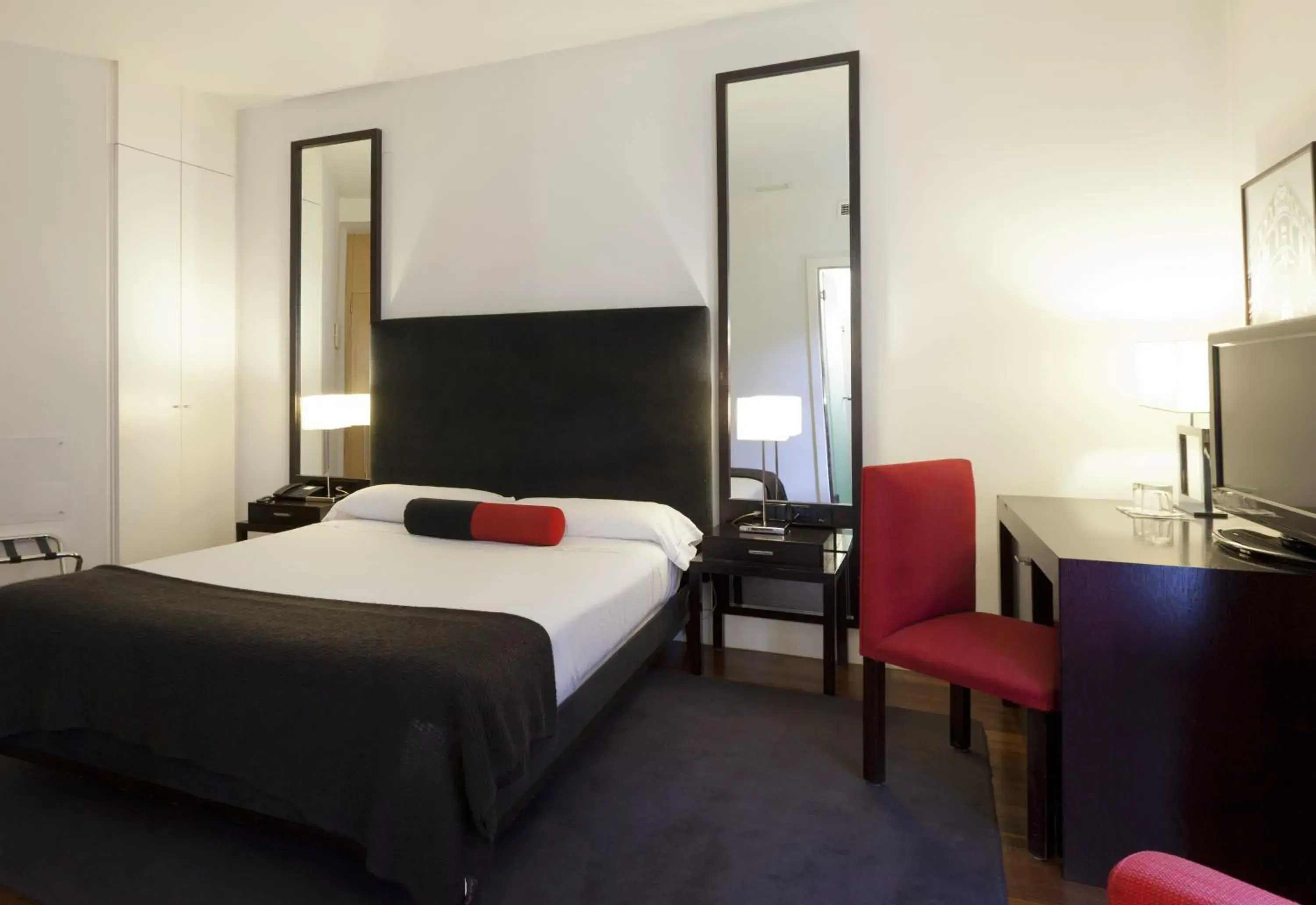 Seating area, Bed in Quatro Puerta del Sol Seating area, Bed in Quatro Puerta del Sol