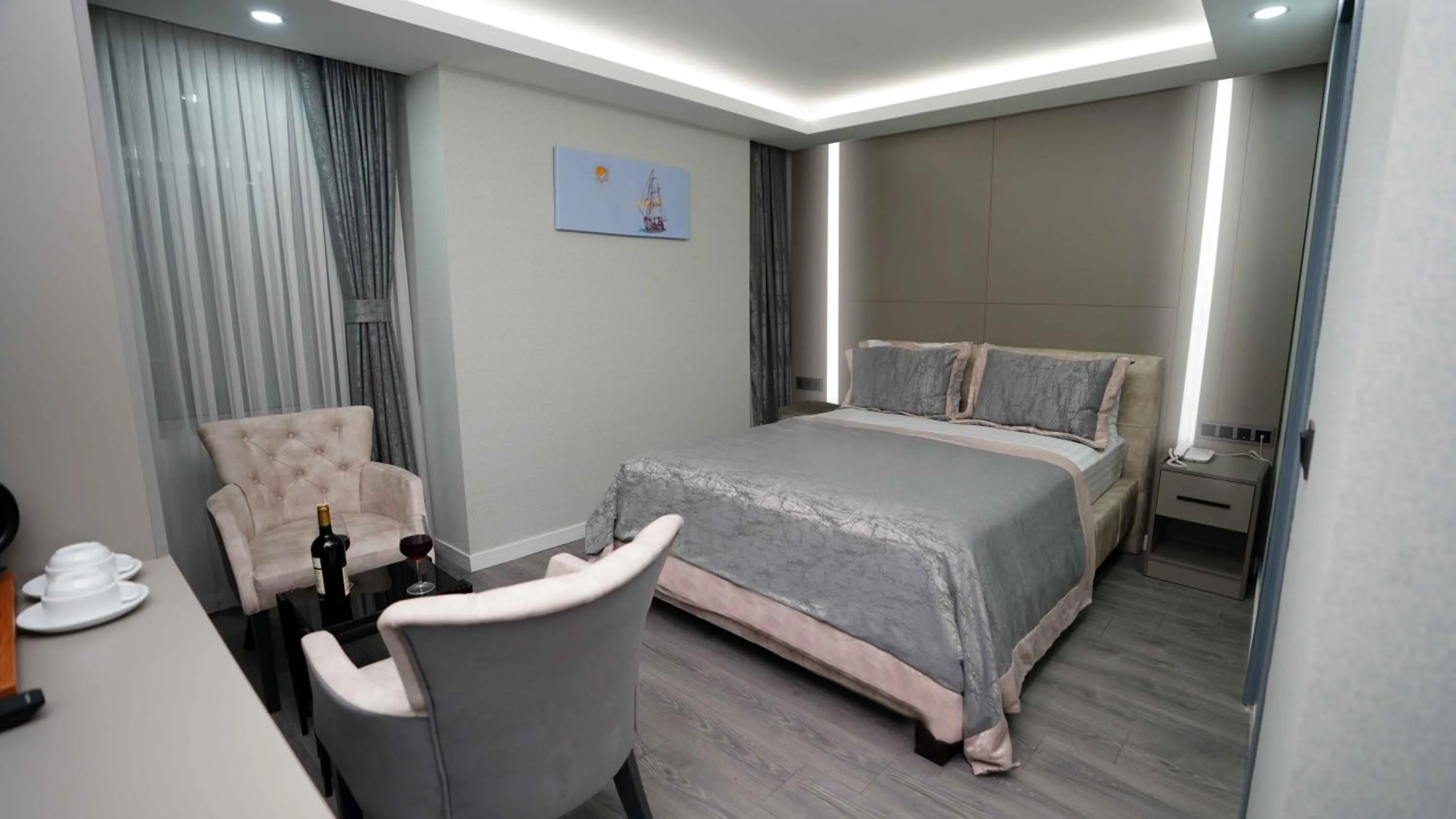 Bed in AURA MARINA HOTEL