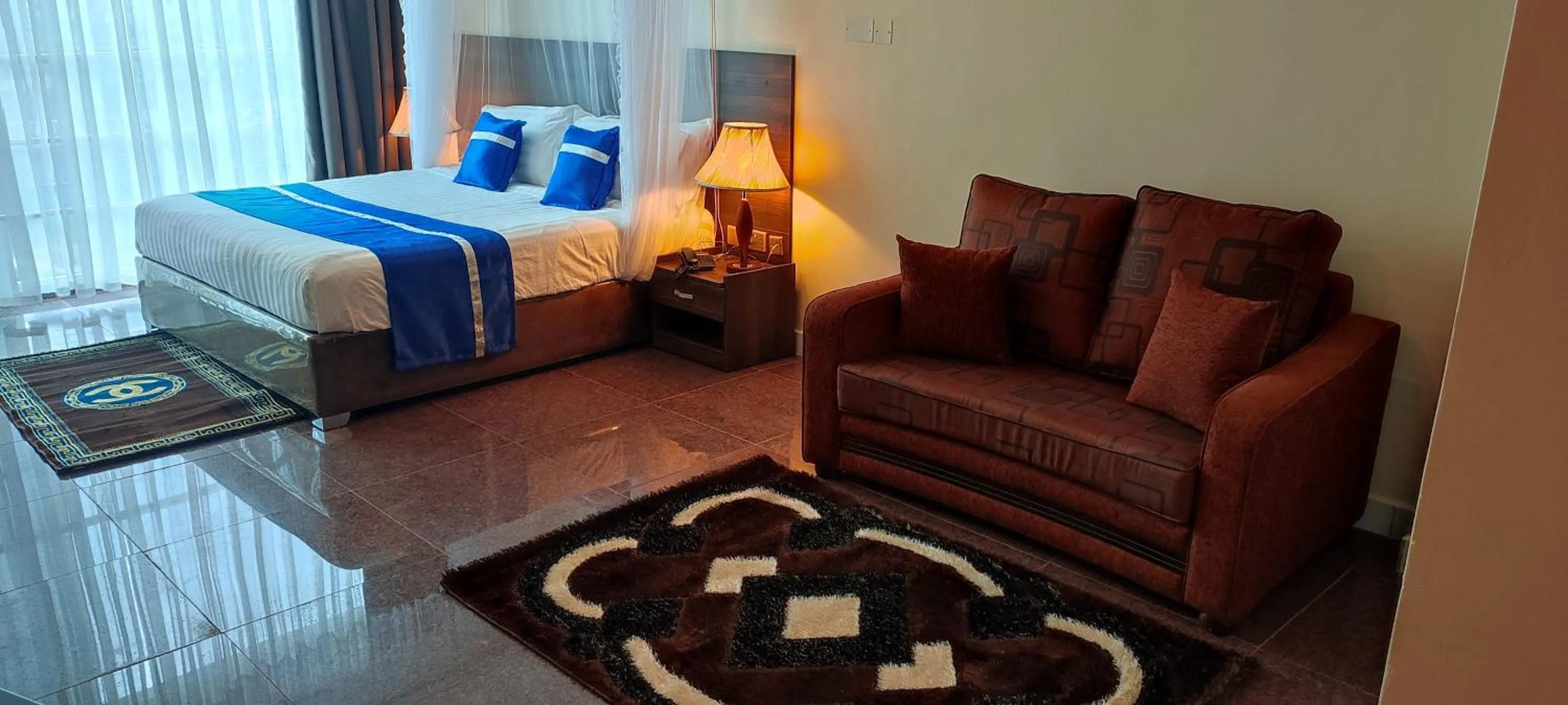 Living room, Bed in Koki Hotel