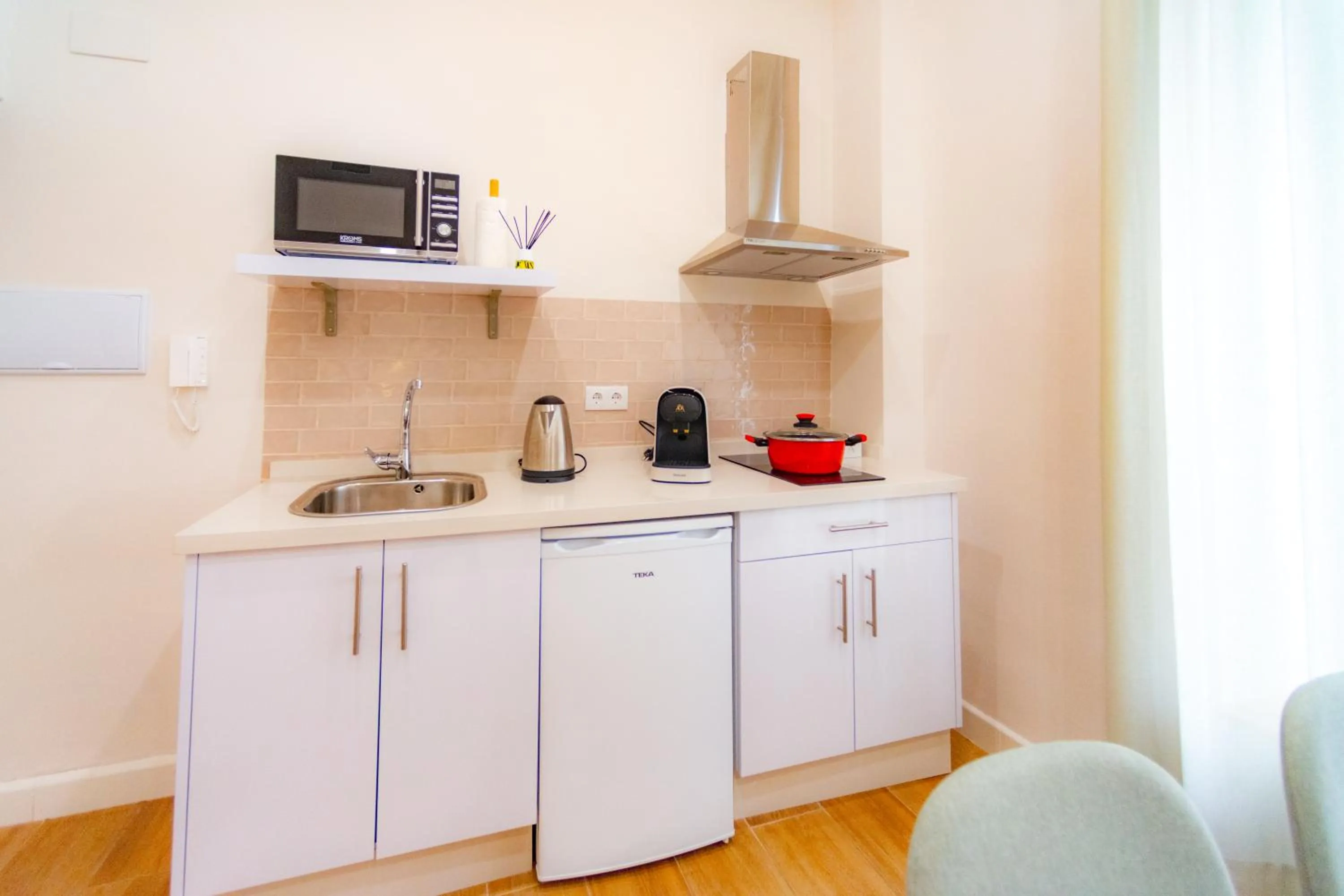 Kitchen or kitchenette in Suites Casa San Mateo