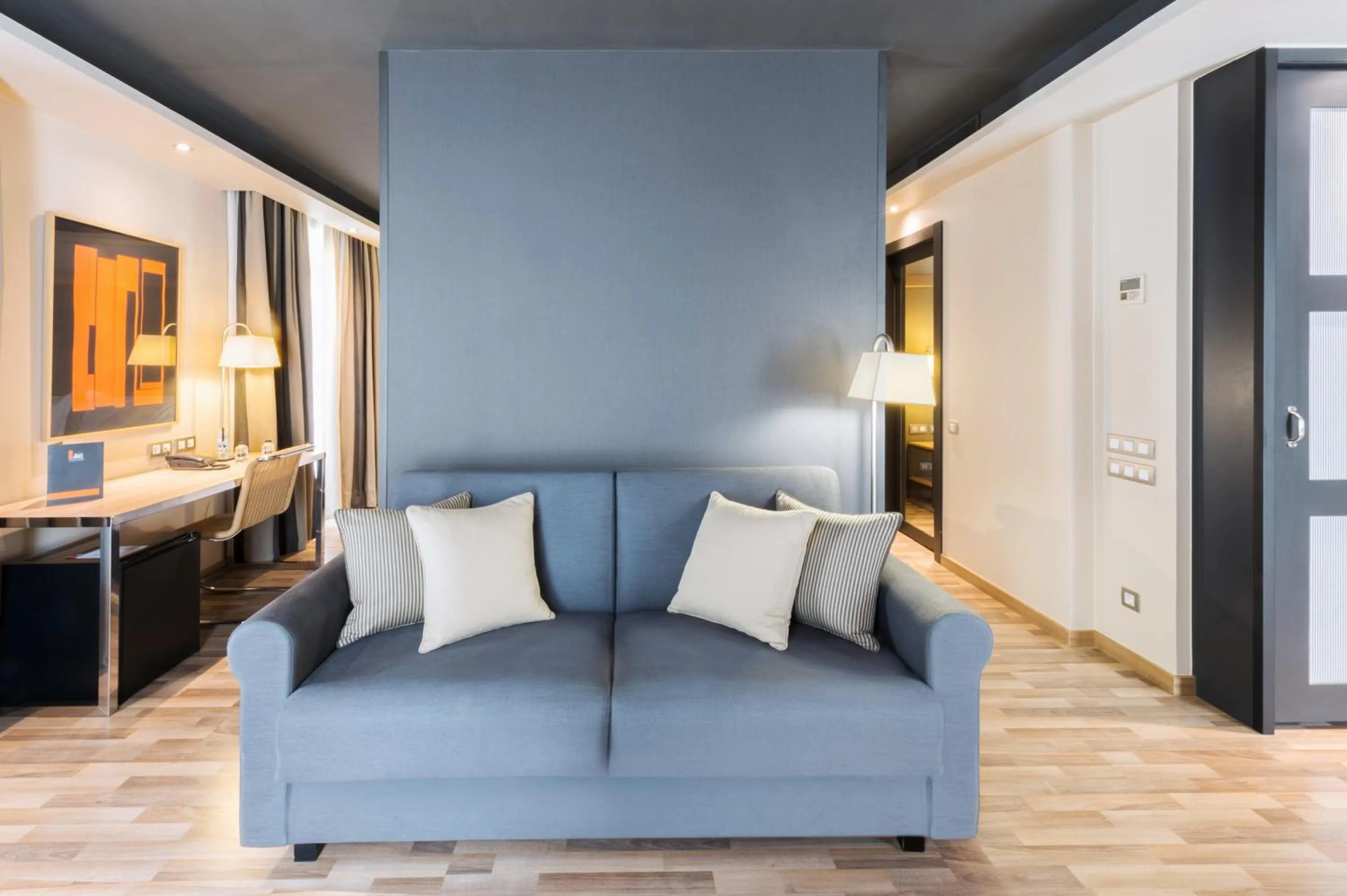 Seating area, Bed in Hotel Jazz