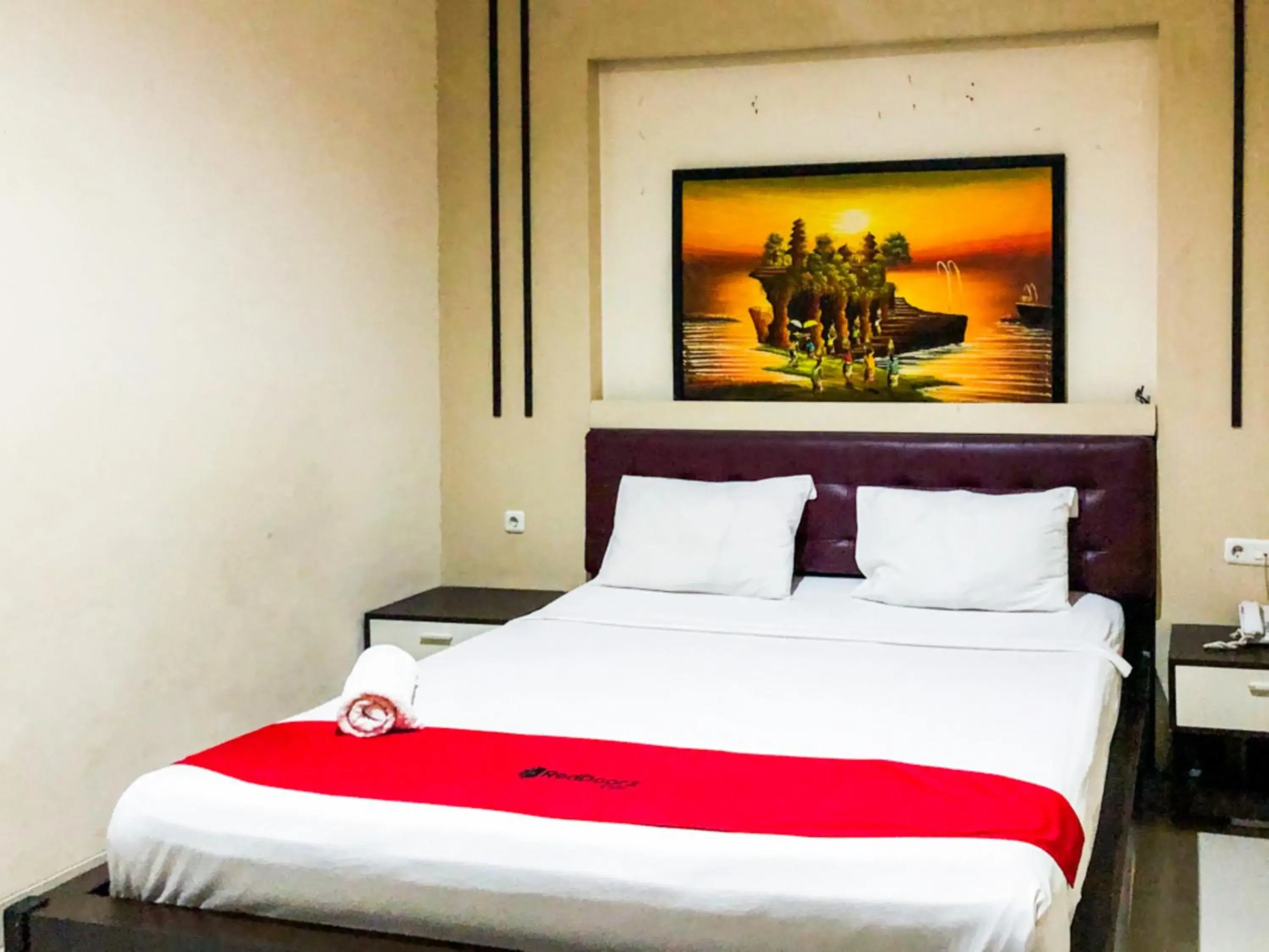 Bed in RedDoorz At Hotel Gajah Mada Palu Bed in RedDoorz At Hotel Gajah Mada Palu