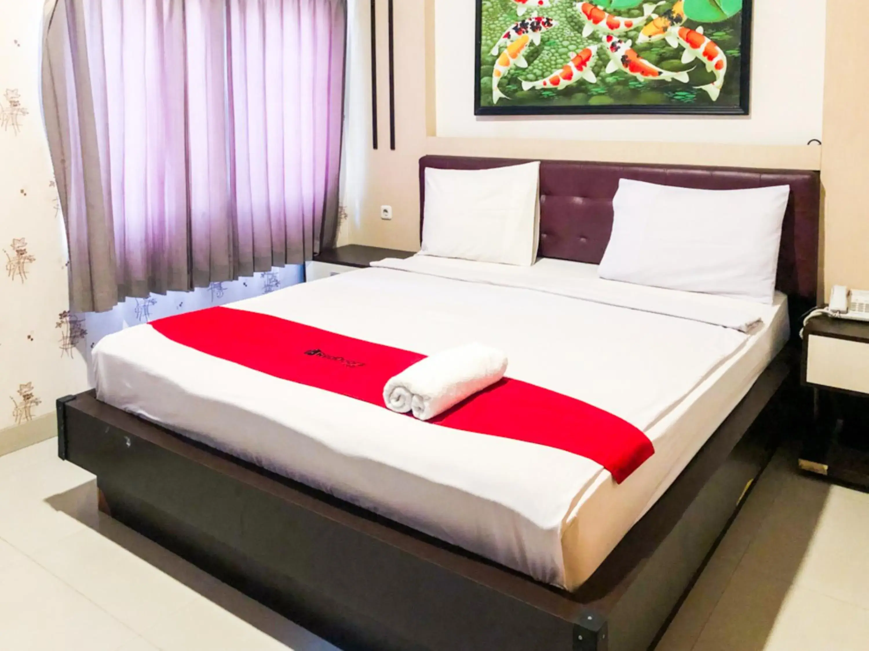 Bed in RedDoorz At Hotel Gajah Mada Palu Bed in RedDoorz At Hotel Gajah Mada Palu