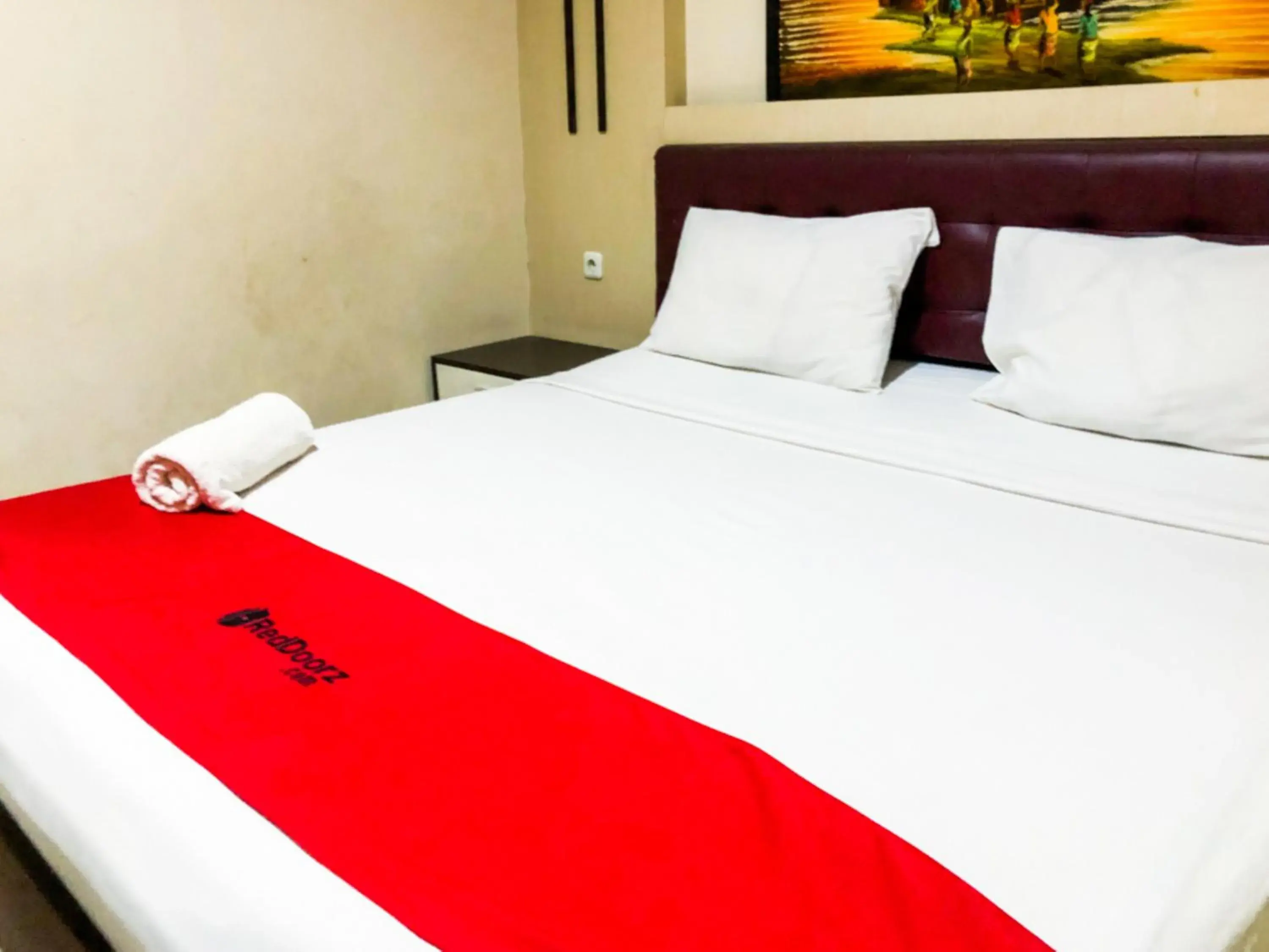Bed in RedDoorz At Hotel Gajah Mada Palu Bed in RedDoorz At Hotel Gajah Mada Palu