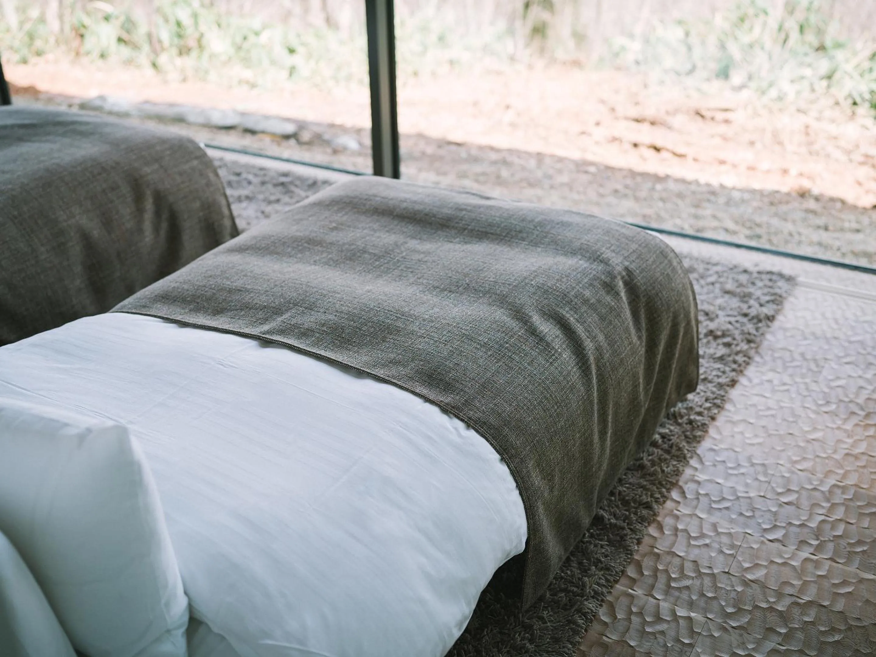 Bed in SNOW PEAK FIELD SUITE SPA HEADQUARTERS